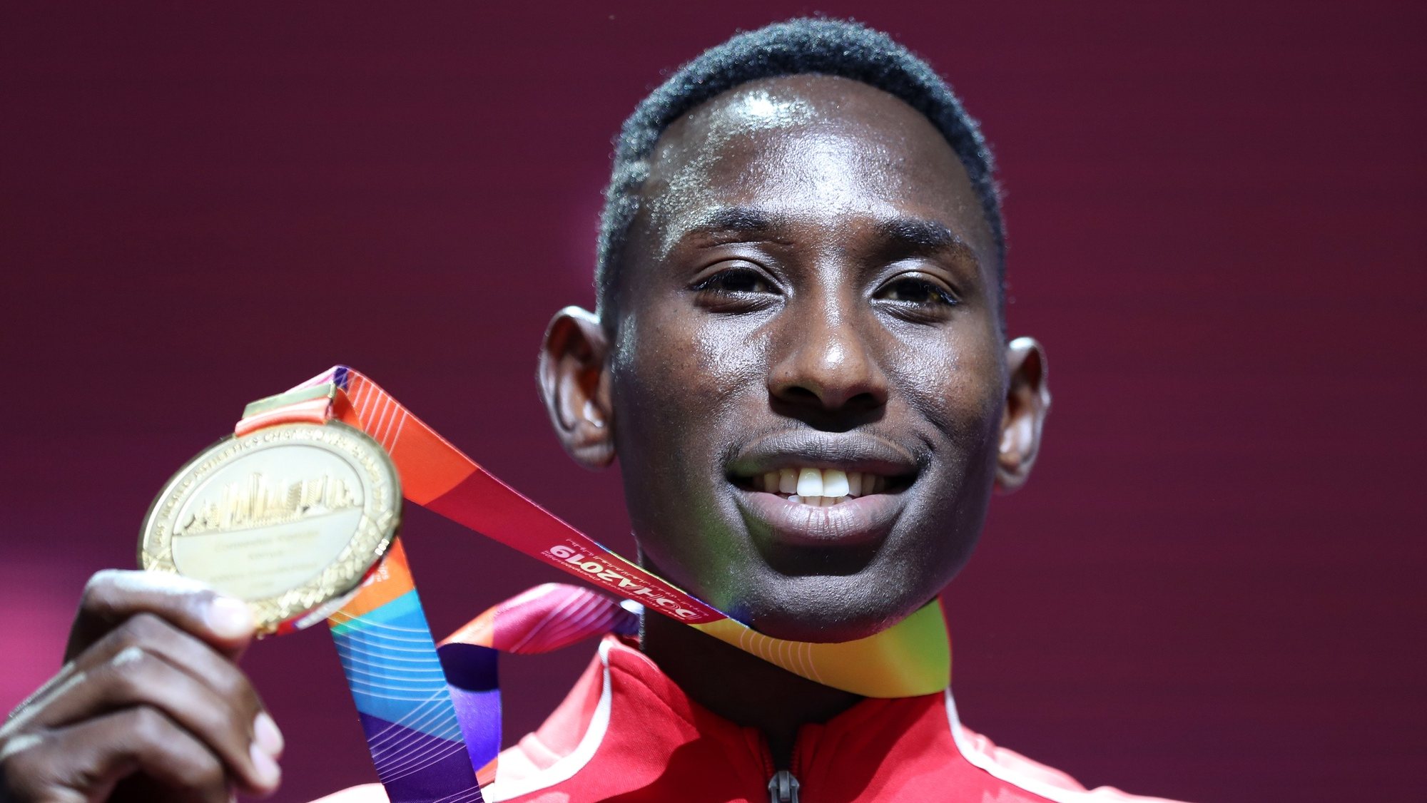 epa07898293 Gold medalist Conseslus Kipruto of Kenya during the medal ceremony for the men&#039;s 3000m Steeplechase at the IAAF World Athletics Championships 2019 at the Khalifa Stadium in Doha, Qatar, 05 October 2019.  EPA/ALI HAIDER