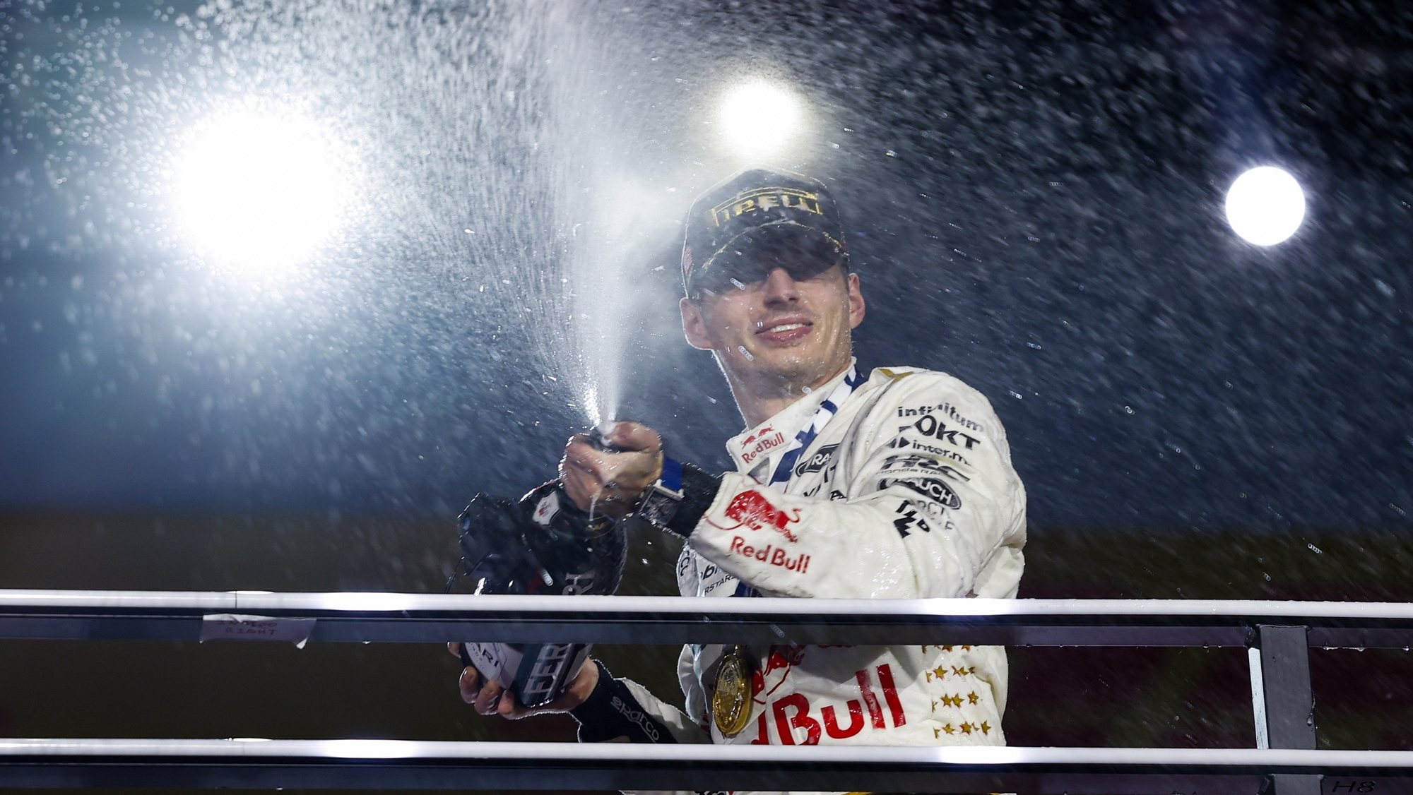 epaselect epa10983948 Dutch Formula One driver Max Verstappen of Red Bull Racing celebrates on the podium after winning the Formula 1 Las Vegas Grand Prix, in Las Vegas, USA, 18 November 2023.  EPA/CAROLINE BREHMAN
