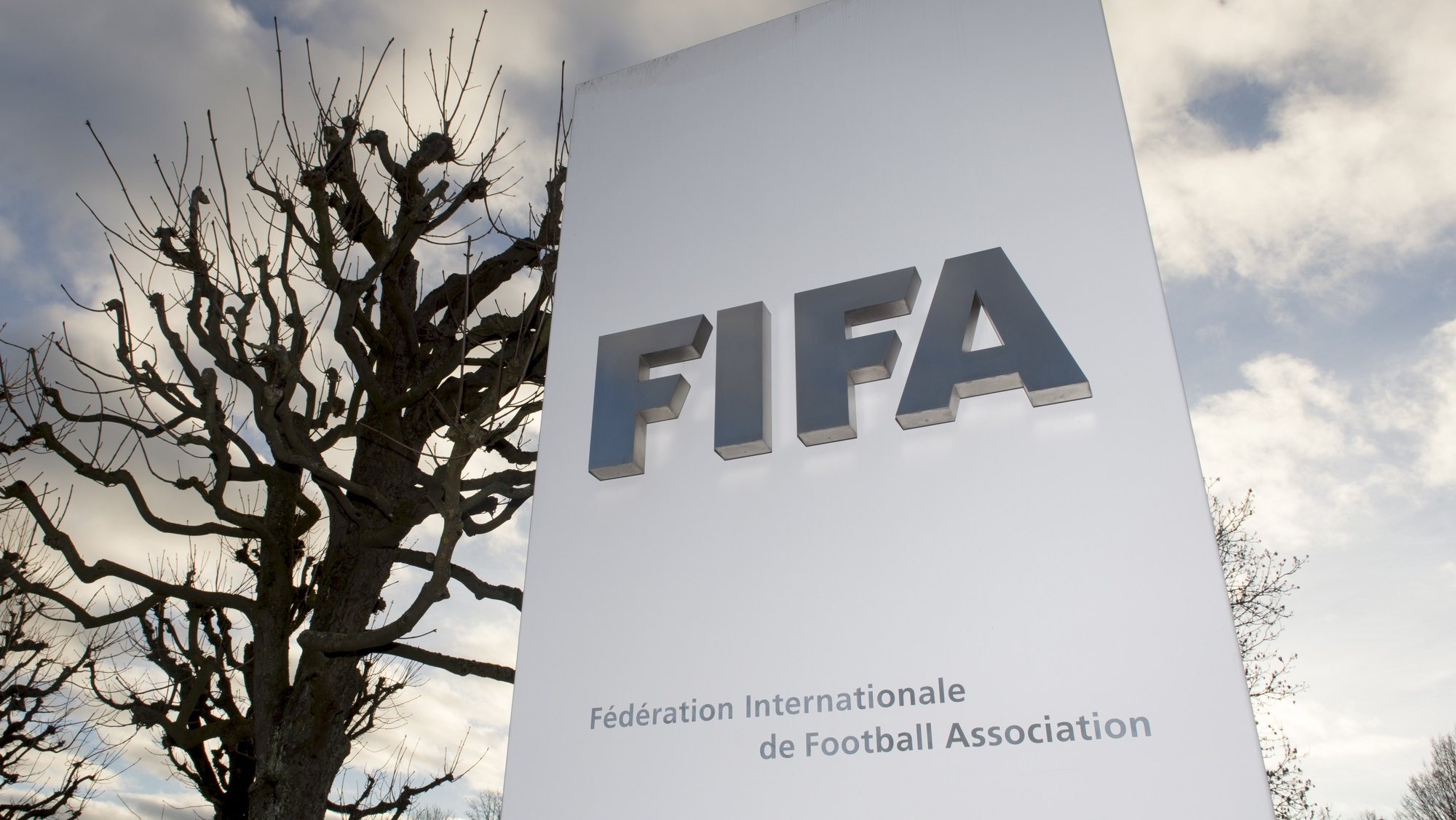 epa09792207 (FILE) - The FIFA logo is pictured outside of the FIFA Headquarters &#039;Home of FIFA&#039; in Zurich, Switzerland, 17 December 2015 (re-issued on 28 February 2022). The world&#039;s football governing body FIFA together with the governing body of European football UEFA announced on 28 February 2022 to have decided together &#039;that all Russian teams, whether national representative teams or club teams, shall be suspended from participation in both FIFA and UEFA competitions until further notice&#039;.  EPA/WALTER BIERI *** Local Caption *** 52472788