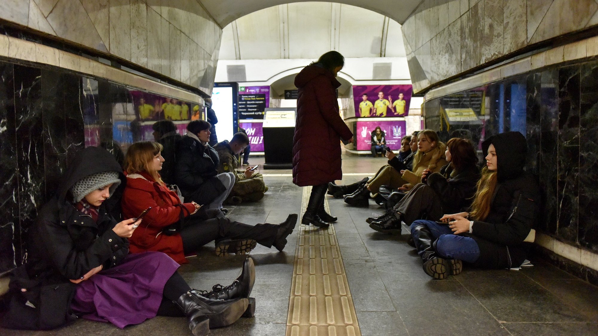epa10459445 People take shelter in a subway station during an air raid alert in Kyiv (Kiev), Ukraine, 10 February 2023. Ukraine&#039;s Air Force confirmed the downing of 61 out of 71 Russian missiles launched on 10 February across the country. Russian troops entered Ukraine on 24 February 2022 resulting in fighting and destruction in the country, and triggering a series of severe economic sanctions on Russia.  EPA/OLEG PETRASYUK