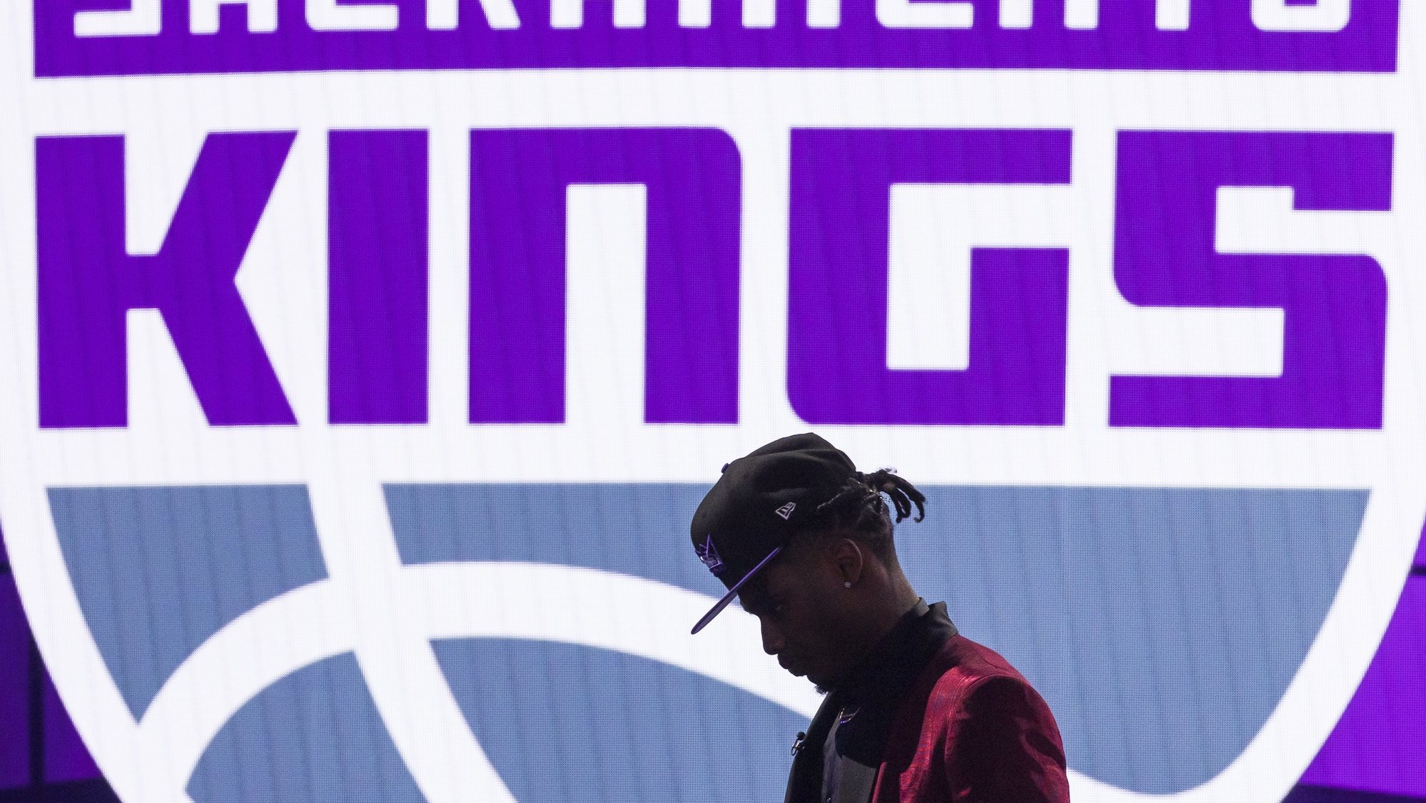 epa09377860 Basketball player Davion Mitchell walks off stage after being the ninth overall draft pick by the Sacramento Kings during the 2021 NBA Draft at the Barclays Center in the Brooklyn borough of New York, New York, USA, 29 July 2021.  EPA/JUSTIN LANE SHUTTERSTOCK OUT