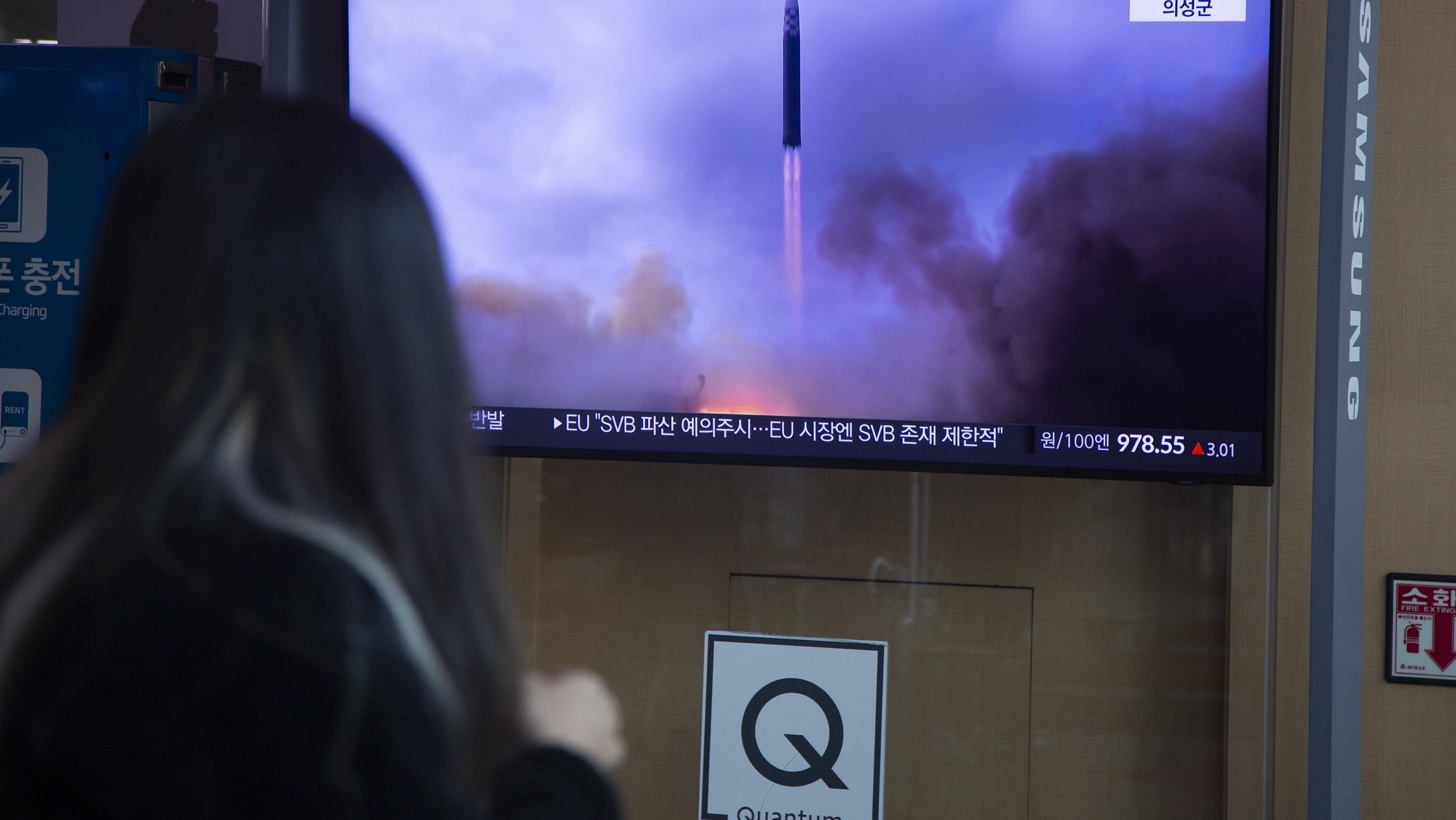 epa10521597 A woman watches the news at a station in Seoul, South Korea, 14 March 2023. According to South Korea&#039;s Joint Chiefs of Staff (JCS), in the early morning of 14 March, North Korea launched two short-range ballistic missiles into the East Sea, amid US-South Korean joint military drills.  EPA/JEON HEON-KYUN