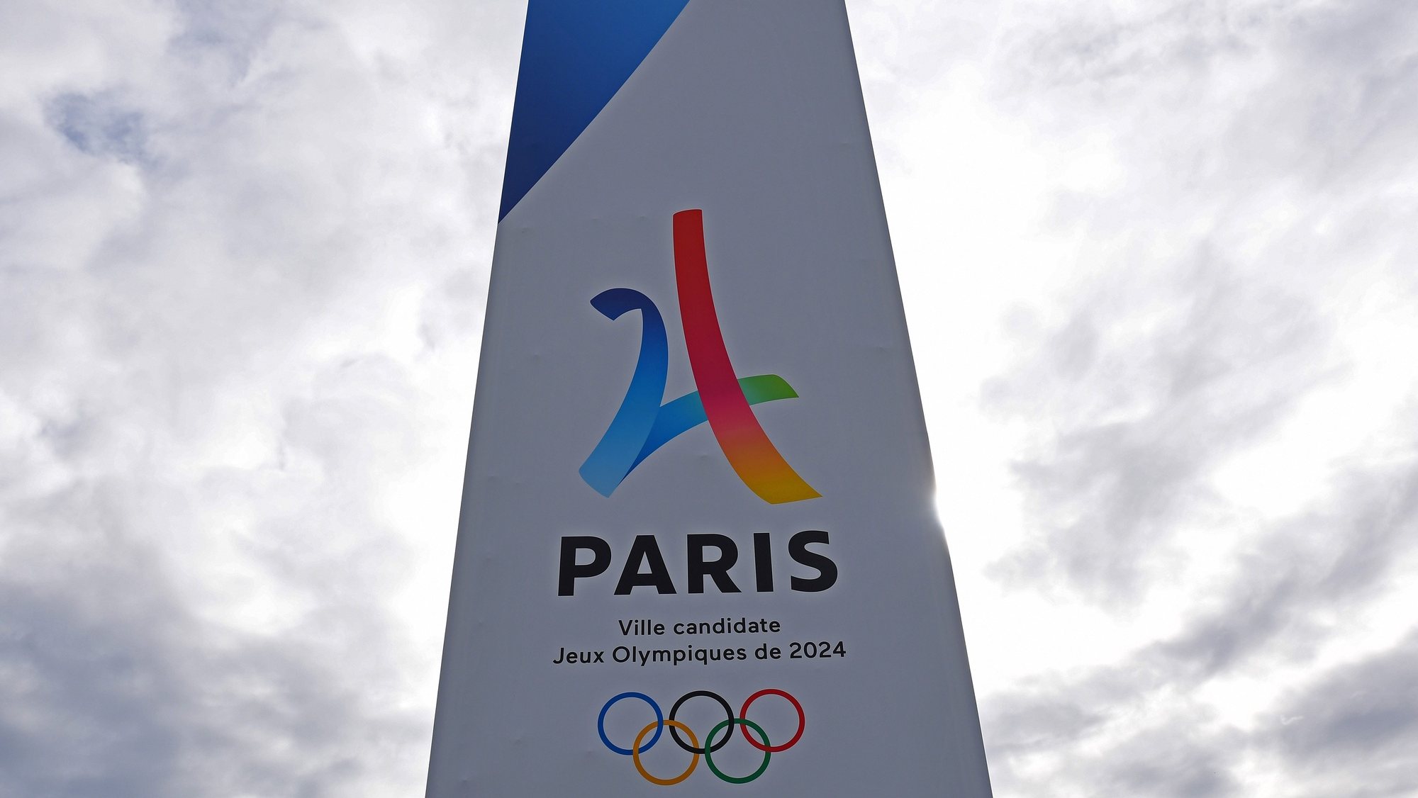 epa06119018 (FILE) - A logo for the Paris Olympic 2024 bid at the site of the planned media village during a press tour of the International Olympic Committee (IOC) Evaluation Commission, in Le Bourget, north of Paris, France, 15 May 2017. Media outlets report, 31 July 2017, that the Los Angeles Olympic bid committee has agreed to wait until 2028 to host the games, leaving Paris poised to host the 2024 Summer Olympics.  EPA/CHRISTOPHE PETIT TESSON
