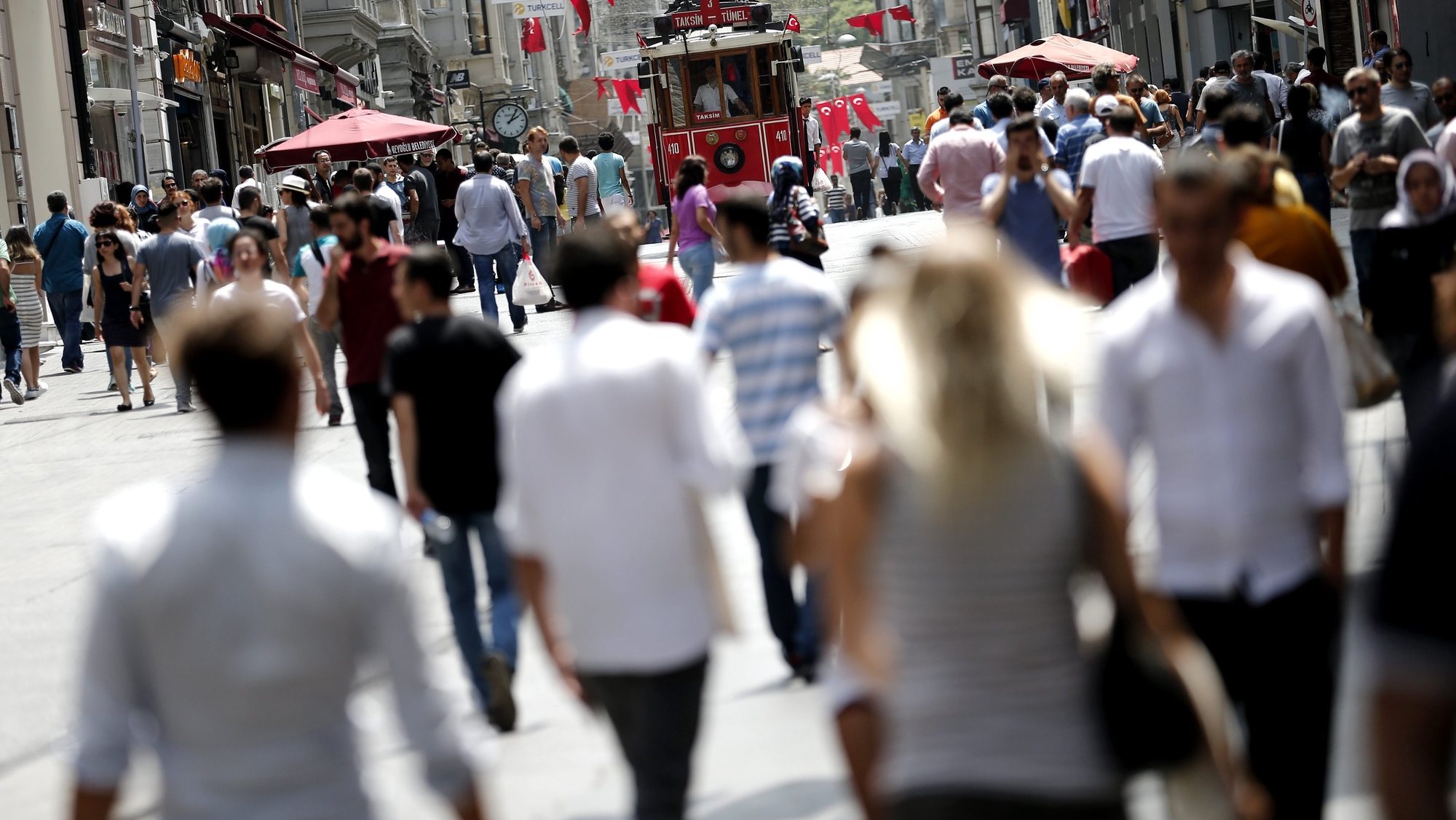 epa05430345 People walk on Istiklal Street near Taksim Square,  in Istanbul, Turkey, 18 July 2016. Turkish Prime Minister Yildirim reportedly said that the Turkish military was involved in an attempted coup d&#039;etat. Turkish President Recep Tayyip Erdogan has denounced the coup attempt as an &#039;act of treason&#039; and insisted his government remains in charge. Some 104 coup plotters were killed, 90 people - 41 of them police and 47 are civilians - &#039;fell martrys&#039;, after an attempt to bring down the Turkish government, the acting army chief General Umit Dundar said in a televised appearance.who were killed in a coup attempt on 16 July, during the funeral, in Istanbul, Turkey, 17 July 2016. Turkish Prime Minister Yildirim reportedly said that the Turkish military was involved in an attempted coup d&#039;etat. Turkish President Recep Tayyip Erdogan has denounced the coup attempt as an &#039;act of treason&#039; and insisted his government remains in charge. Some 104 coup plotters were killed, 90 people - 41 of them police and 47 are civilians - &#039;fell martrys&#039;, after an attempt to bring down the Turkish government, the acting army chief General Umit Dundar said in a televised appearance.  EPA/SEDAT SUNA