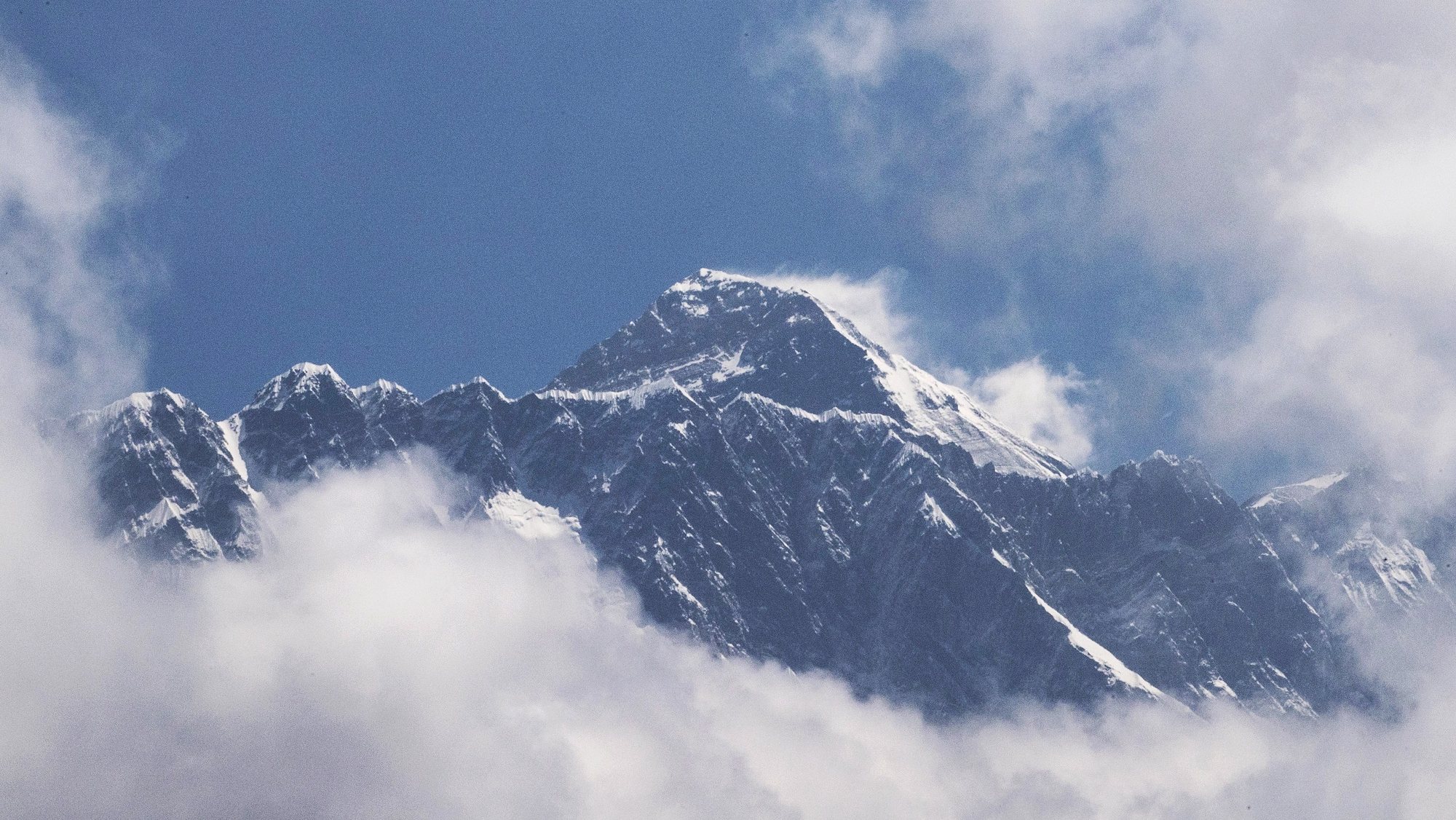 epa08869819 (FILE) - World&#039;s tallest peak, Mount Everest, as seen from Namche Bazar, Solukhumbu district, Nepal 27 May 2019 (reissued 08 December 2020). Nepal and China have agreed on a new official height for Mount Everest. The height of the world&#039;s highest peak is now given as 8848.86 meters. In the past two years, China and Nepal have sent teams to take measurements at the summit in the border area.  EPA/NARENDRA SHRESTHA *** Local Caption *** 55949778