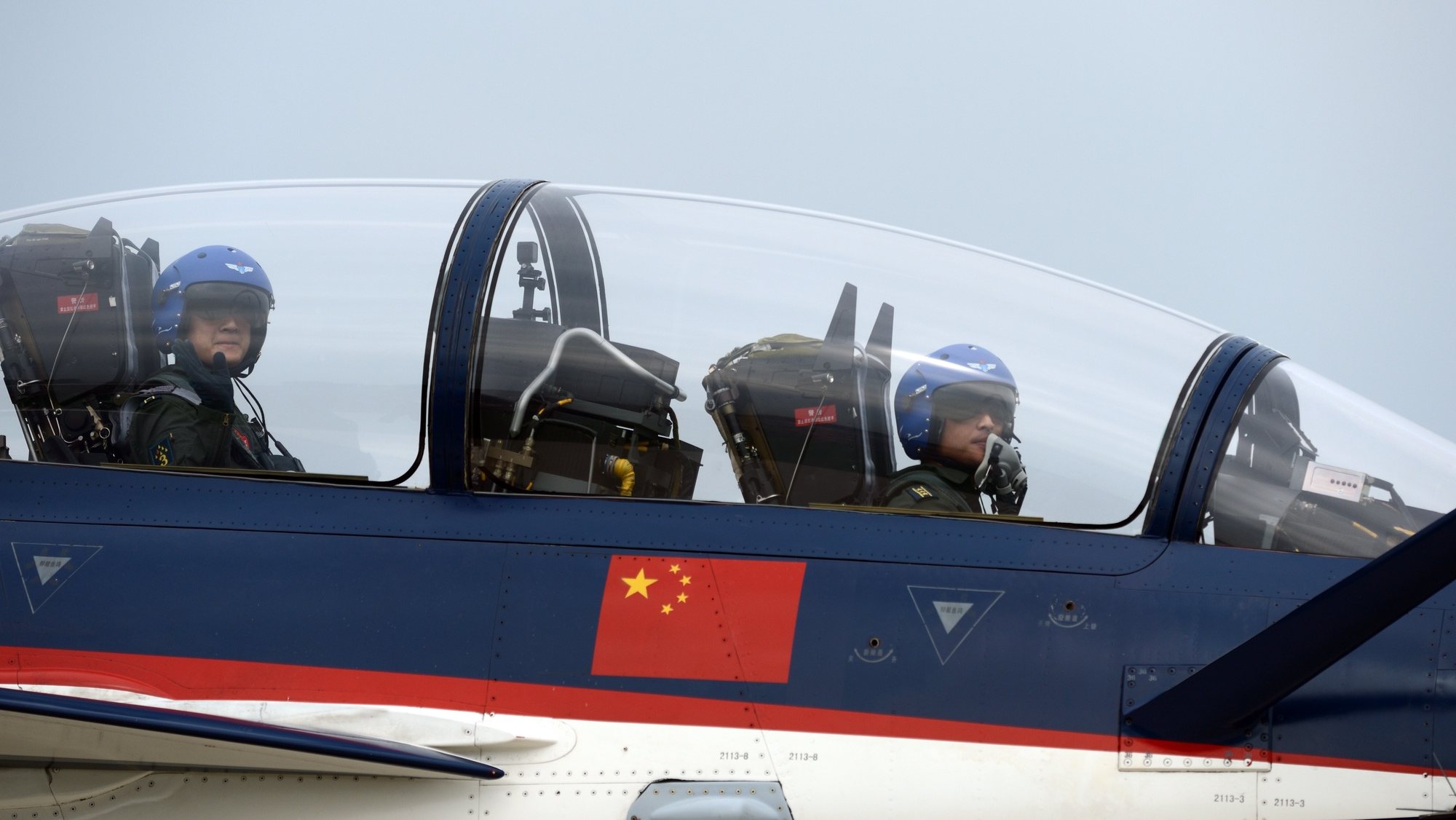 epa06998541 Members of the August 1st Aerobatic Team drive J-10 fighter jet to perform at Aviation University of Air Force during an aviation open day of the Air Force in Changchun, China&#039;s Jilin province, 02 September 2018 (issued 05 September 2018). The aviation open day of the Air Force of the CPLA and the opening ceremony for the Aviation University of Air Force (AUAF) was held at the Dafangshen Airport in Changchun from 30 August to 02 September 2018.  EPA/STRINGER CHINA OUT