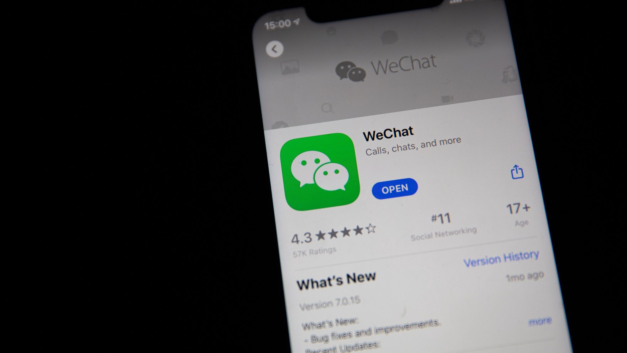 epa08685856 A generic illustration shows the logo of Chinese internet media app WeChat on a phone, in Beijing, China, 21 September 2020. Chinese-owned mobile app WeChat was set to stop operation in the U.S. on midnight 20 September 2020.  EPA/ROMAN PILIPEY