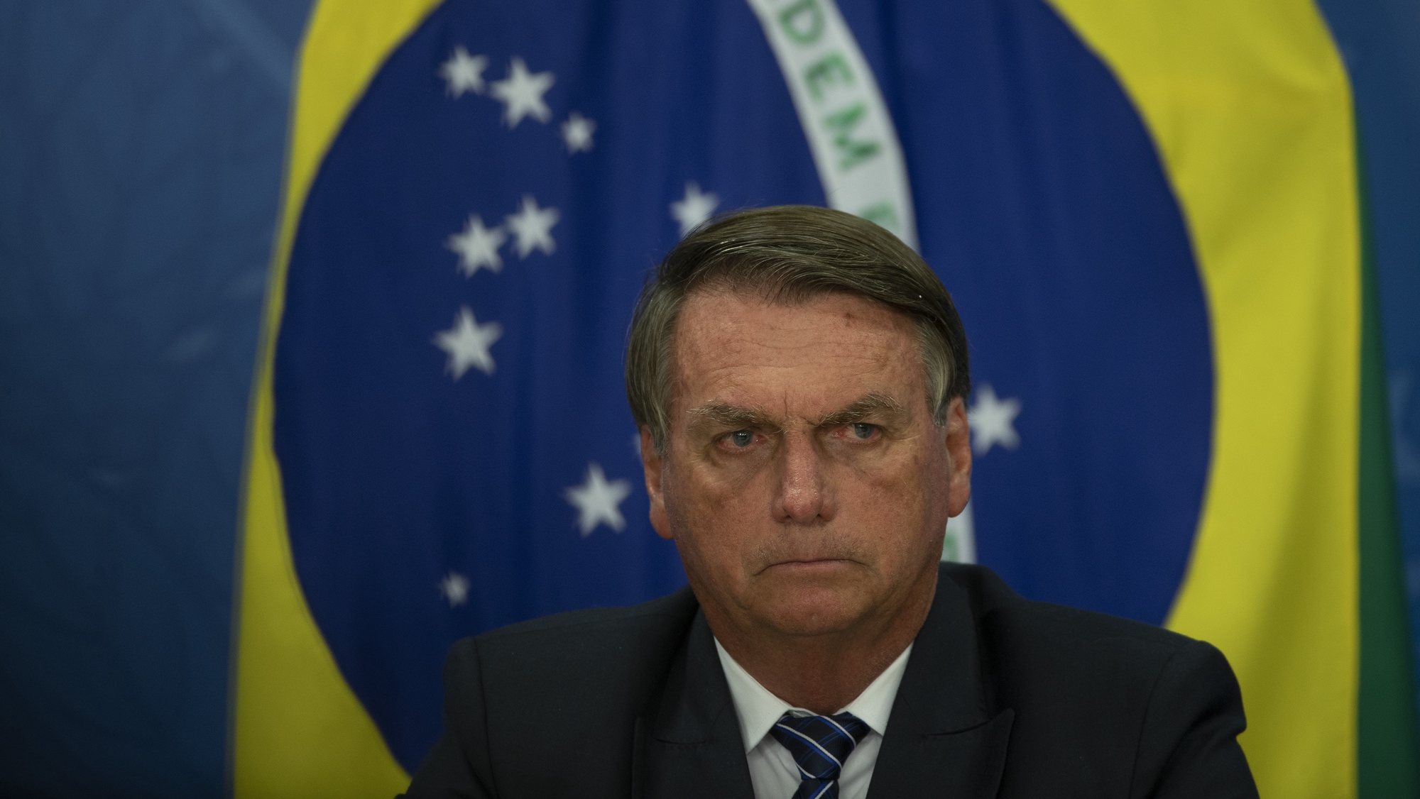 epa09999781 The President of Brazil, Jair Bolsonaro, takes part during a press conference on his policies to control fuel prices, at the Planalto Palace in Brasilia, Brazil, 06 June 2022. Bolsonaro announced that the Federal Government will reimburse the states for the loss of income that would derive from the bill that establishes a maximum rate for the tax on fuels. The President also announced that his Government will demand in return that the states reduce the ICMS tax rate on diesel to zero.  EPA/Joedson Alves