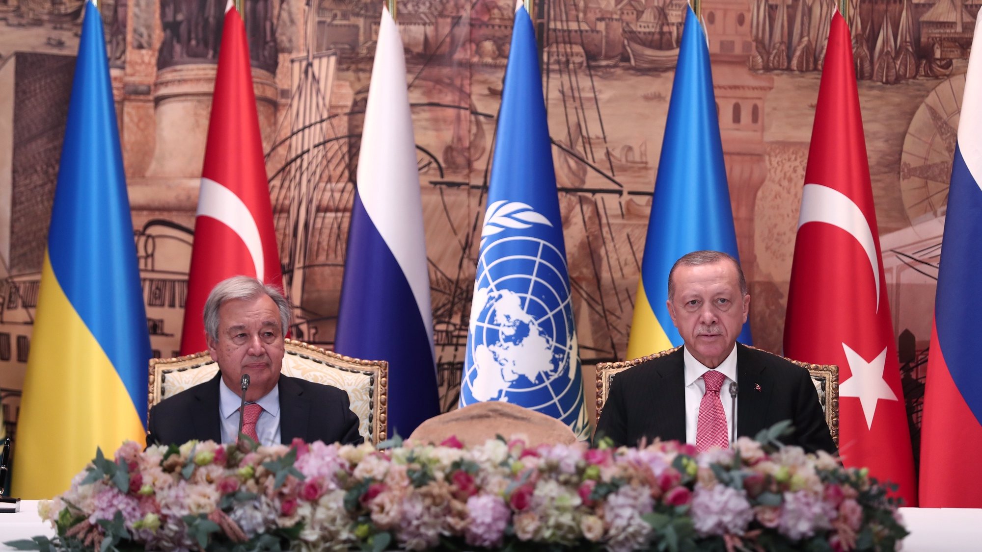 epa10086366 Turkish President Recep Tayyip Erdogan (R) and UN Secretary-General Antonio Guterres (L) attend a signing ceremony of the grain shipment agreement between Turkey-UN, Russia and Ukraine, after their meeting in Istanbul, Turkey, 22 July 2022. According to the agreement, a coordination center will be established to carry out joint inspections at the ports and ensure route security.  EPA/SEDAT SUNA