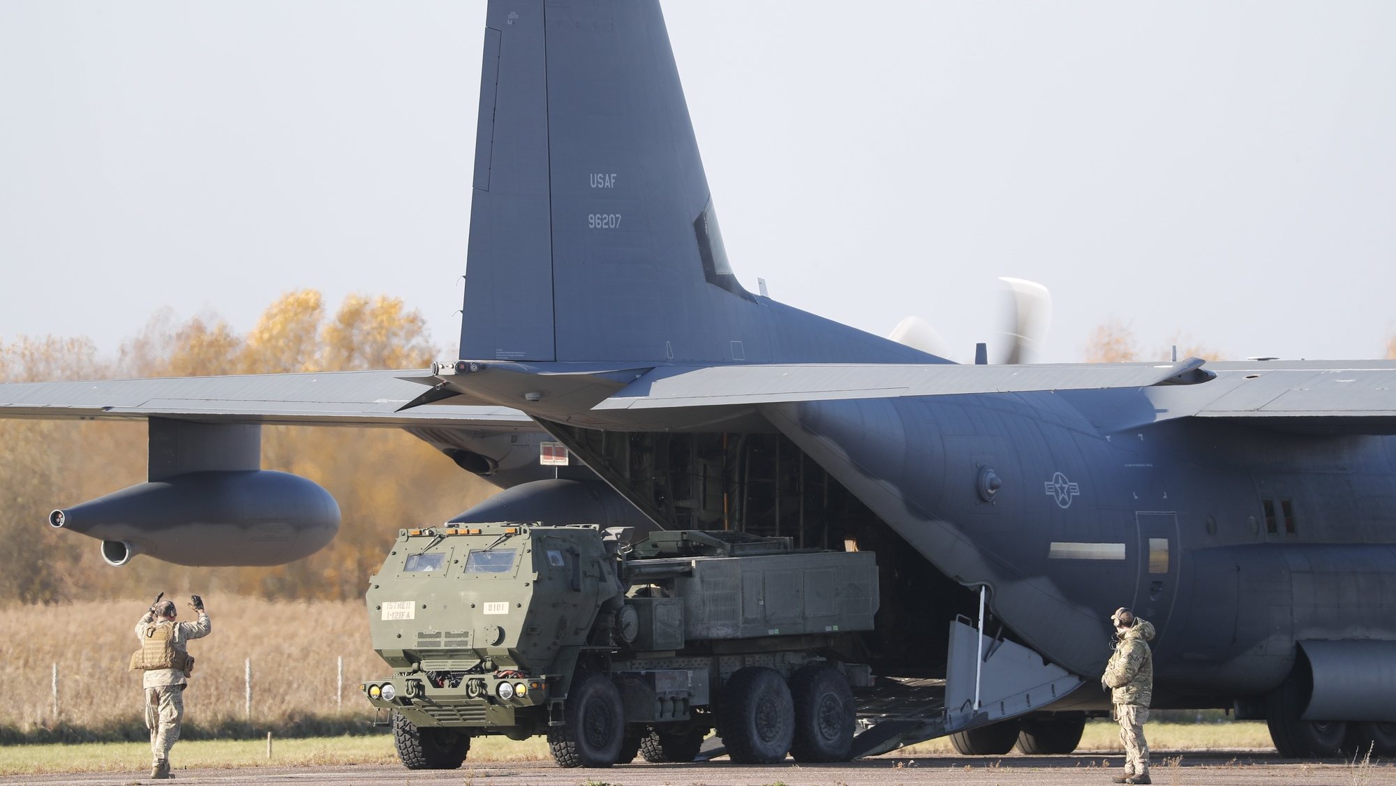 epa09545435 A US Army High Mobility Artillery Rocket System (HIMARS) comes out of the US Air Force special operation aircraft MC-130J Commando II (R) during a landing exercise at Spilva airfield in Riga, Latvia, 25 October 2021. The US Air Force special operation aircraft MC-130J Commando II took part in a landing exercise demonstrating the rapid delivery and deployment of US Army High Mobility Artillery Rocket System (HIMARS). The aim of the exercise is to demonstrate the collective defense capabilities and the ability of the Allies to quickly deliver fire support capabilities to Latvia, providing support to the National Armed Forces in national defense.  EPA/TOMS KALNINS