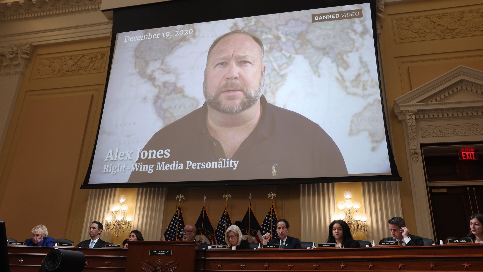 epa10067391 An image of conservative radio and social media personality Alex Jones reacting to a tweet by former US President Donald J. Trump citing election fraud and inviting people to the January 6 rally appears on a screen a public hearing of the House Select Committee to Investigate the January 6th Attack on the US Capitol, on Capitol Hill in Washington, DC, USA, 12 July 2022. The committee is expected to hold at least eight public hearings.  EPA/MICHAEL REYNOLDS