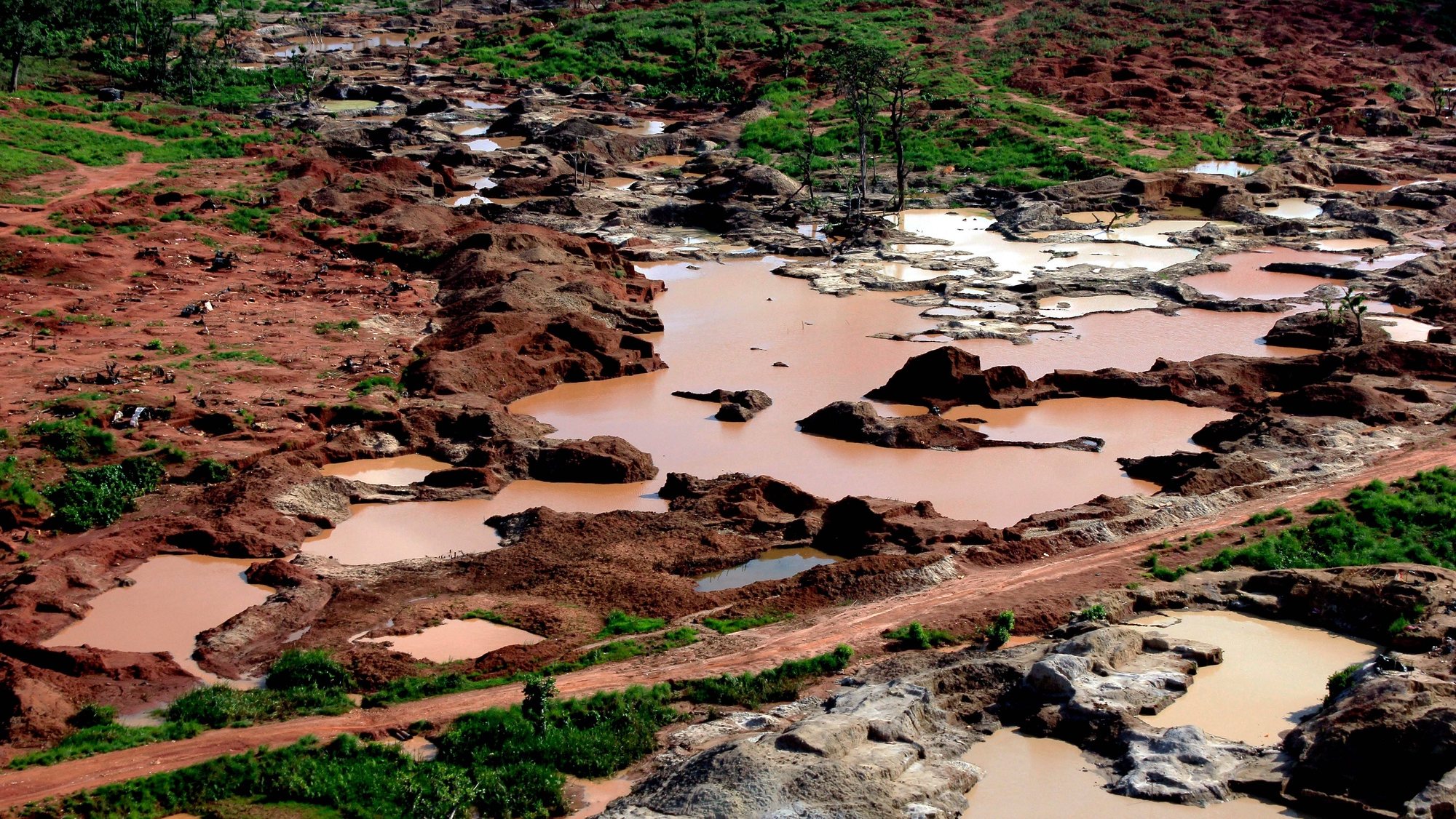 epa07109897 Aerial view of the diamond mines where Congolese migrants were working and began to leave the mining zone following Angolaâ€™s authorities â€˜Operation Transparencyâ€™ in the province of Lunda Norte, Angola, 20 October 2018 (issued 21 October 2018). The operation, which takes place in the Angolan provinces of Lunda Norte, Lunda Sul, Moxico, BiÃ©, Malanje, Cuando-Cubango, UÃ­je, and Zaire, aims to &quot;only restore legality regarding the sale of diamonds and normalize the movement of people and goods&quot;, assure the Angolan authorities.  EPA/AMPE ROGERIO