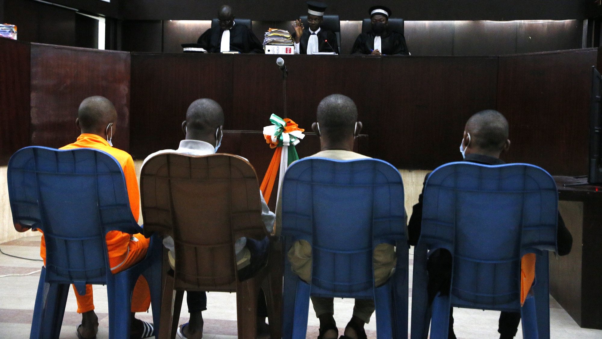 epa10376622 Defendants suspected of the Grand Bassam terrorist attack attend the final verdict of their trial at the Court of Justice in Abidjan, Ivory Coast, 22 December 2022. A small group of armed men attacked the resort town of Grand -Bassam on 13 March 2016, killing at least 19 people and injuring 33 others. The attack was claimed by Al-Qaeda in the Islamic Maghreb. Life imprisonment was requested by the prosecution on 21 December 2022 in Abidjan against four defendants. The final verdict will be pronounced on 28 December 2022.  EPA/LEGNAN KOULA