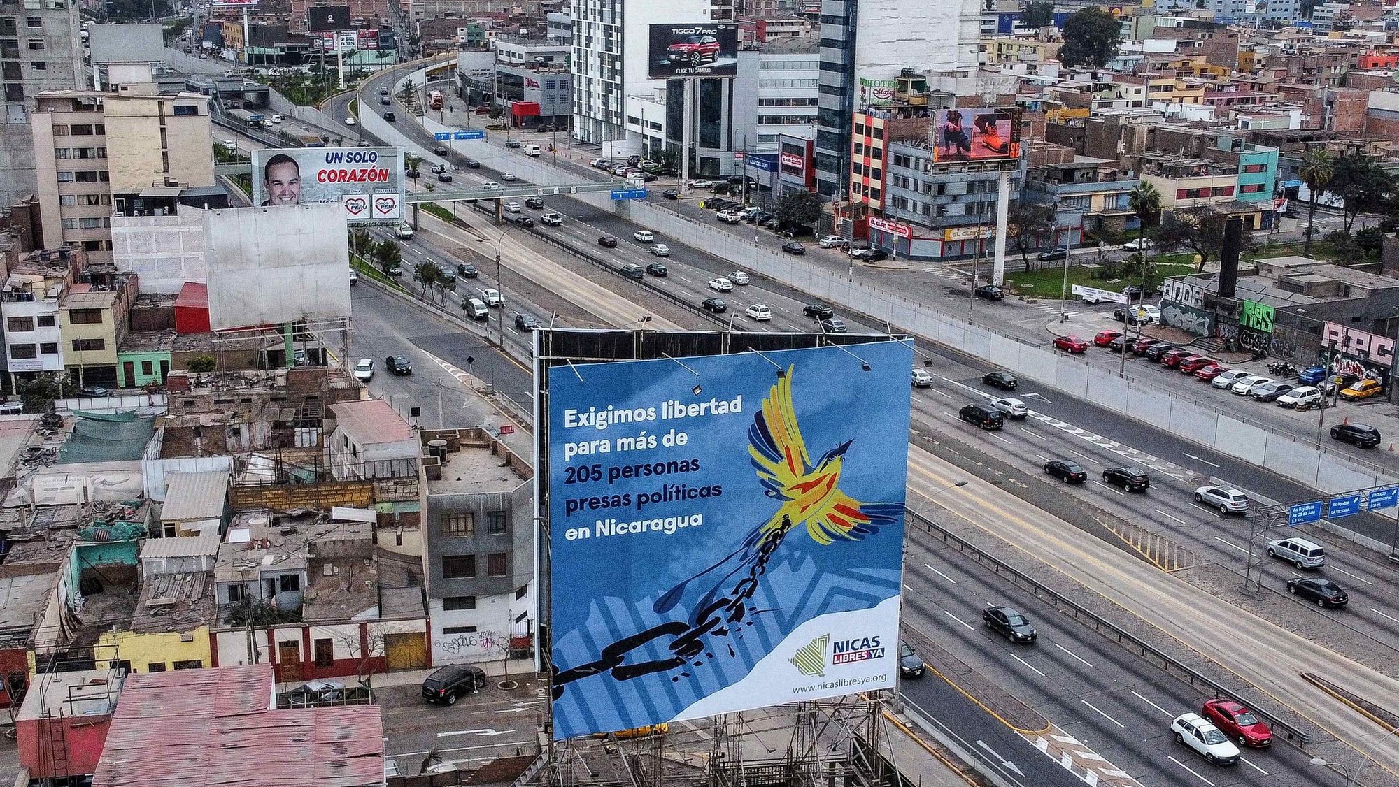 epa10225419 View of a billboard calling for the release of &#039;205 political prisoners in Nicaragua&#039; in the streets of Lima, Peru, 05 October 2022. Peru hosts the fifty-second regular session of the 52nd OAS General Assembly from 05 to 07 October in Lima where delegations from more than 30 countries will arrive.  EPA/Aldair Mejia