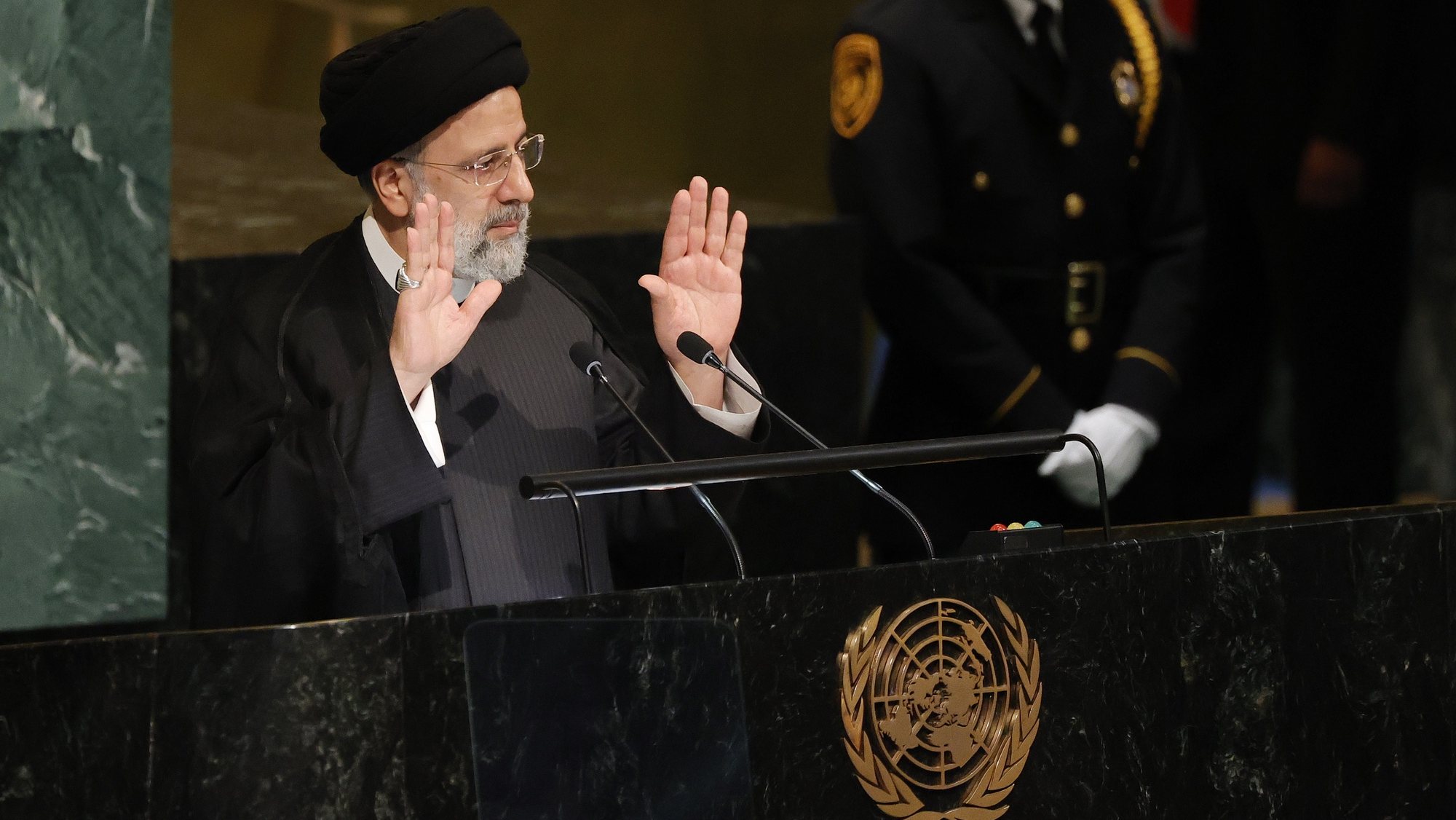 epa10196910 President Seyyed Ebrahim Raisi of Iran delivers his address during the 77th General Debate inside the General Assembly Hall at United Nations Headquarters in New York, New York, USA, 21 September 2022.  EPA/JASON SZENES