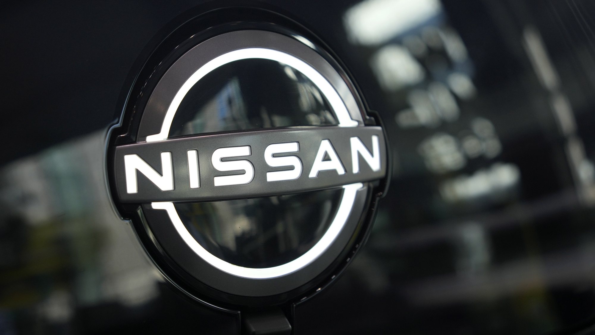 epa10450311 A Nissan logo is seen on vehicle displayed at a Nissan showroom in Tokyo, Japan, 06 February 2023. The Renault-Nissan-Mitsubishi Alliance leaders are expected to hold a joint press conference in London later in the day.  EPA/FRANCK ROBICHON