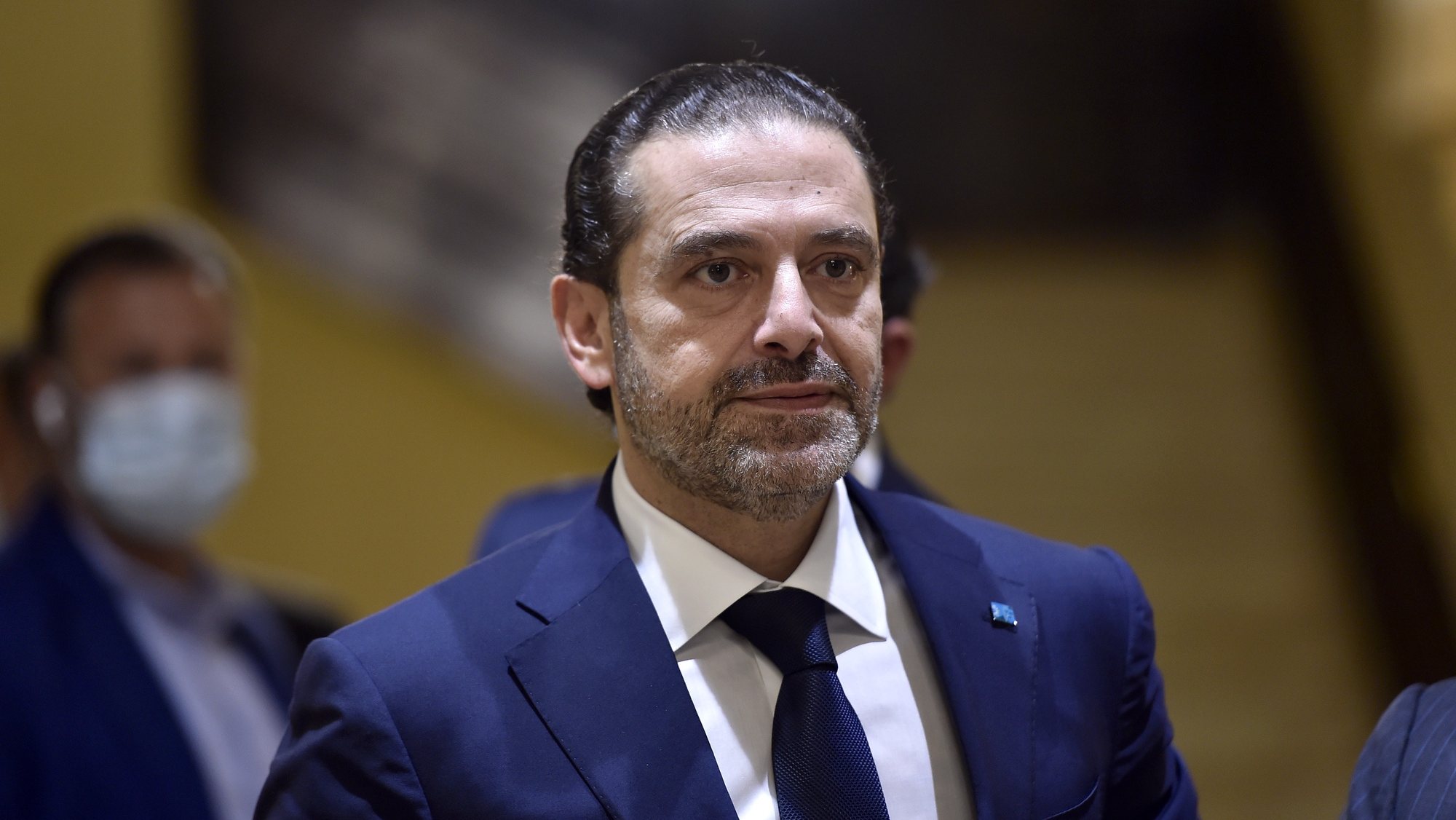 epa09346556 (FILE) - Lebanese Prime Minister-designate Saad Hariri waits before a meeting at his house in Beirut, Lebanon, 07 April 2021 (reissued 15 July 2021). Hariri, who was tasked nine months ago with forming the new government, said on 15 july he is stepping down a day after he presented the cabinet proposal to President Michel Aoun who has not accepted the government.  EPA/WAEL HAMZEH *** Local Caption *** 56811575