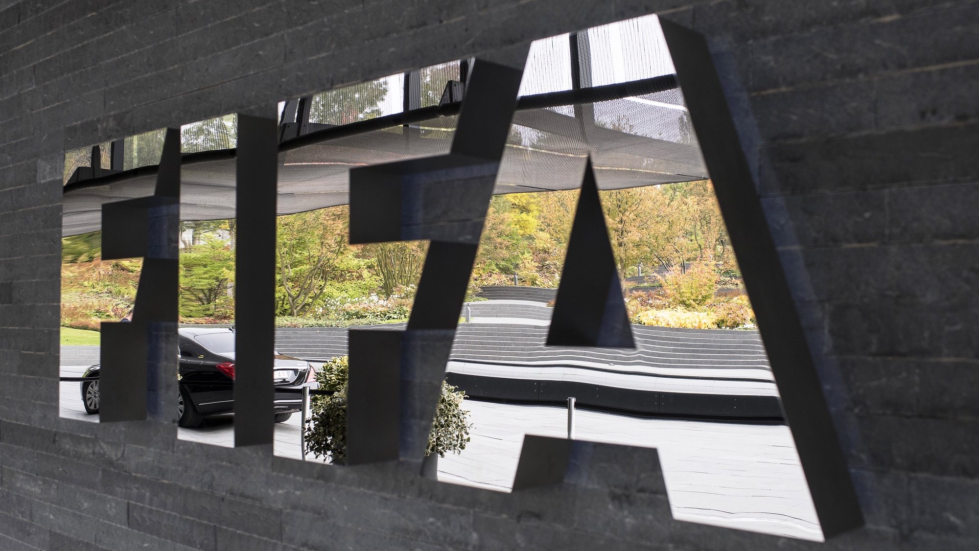 epa09791480 (FILE) - The FIFA logo on display prior to the FIFA Council meeting at the Home of FIFA in Zurich, Switzerland, 14 October 2016 (re-issued on 28 February 2022). The world&#039;s football governing body FIFA has decided that Russia can continue their bid to qualify for the FIFA World Cup 2022 in Qatar, as several nations have announced they will refuse to play Russia.  EPA/ENNIO LEANZA *** Local Caption *** 55995331