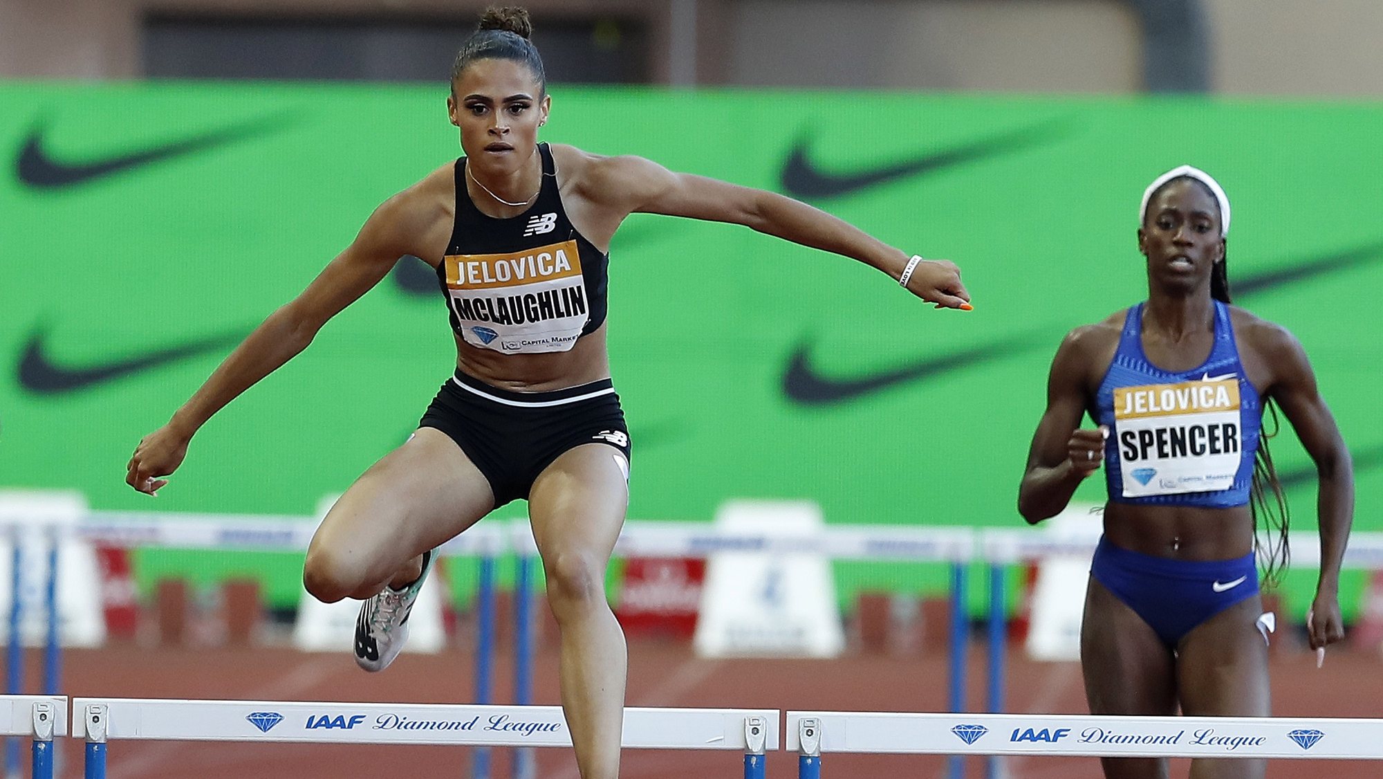 epa09307045 (FILE) - Sydney McLaughlin (L) from the USA competes in the 400m Hurdles Women competition during the IAAF Diamond League meeting at Stade Louis II in Monaco, 12 July 2019 (reissued 28 June 2021). McLaughlin set a new world record of 51.90 seconds in the Women&#039;s 400m Hurdles during the U.S. Olympic Track and Field Trials.  EPA/SEBASTIEN NOGIER