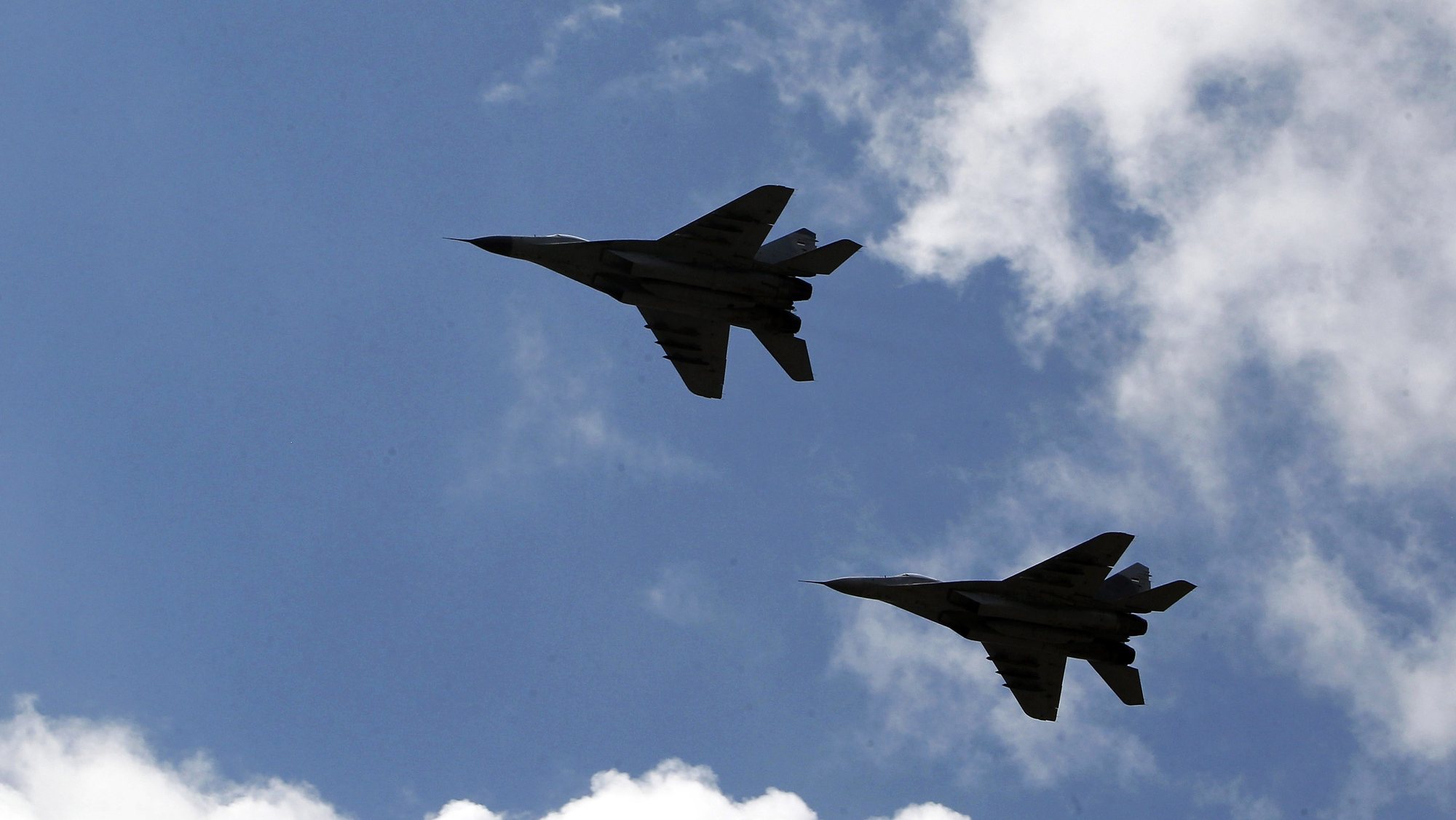 epa07560559 The MIG-29 jet fighters of the Serbian Army fly past during a military parade &#039;Defense of Freedom&#039; to mark the Victory Day in Nis, Serbia, 10 May 2019. About 4,000 members of the Army and Police, 300 combat vehicles and about 40 aircrafts participated in the parade to celebrate the 74th anniversary of the victory in the World War II over Nazi Germany and its allies.  EPA/DJORDJE SAVIC