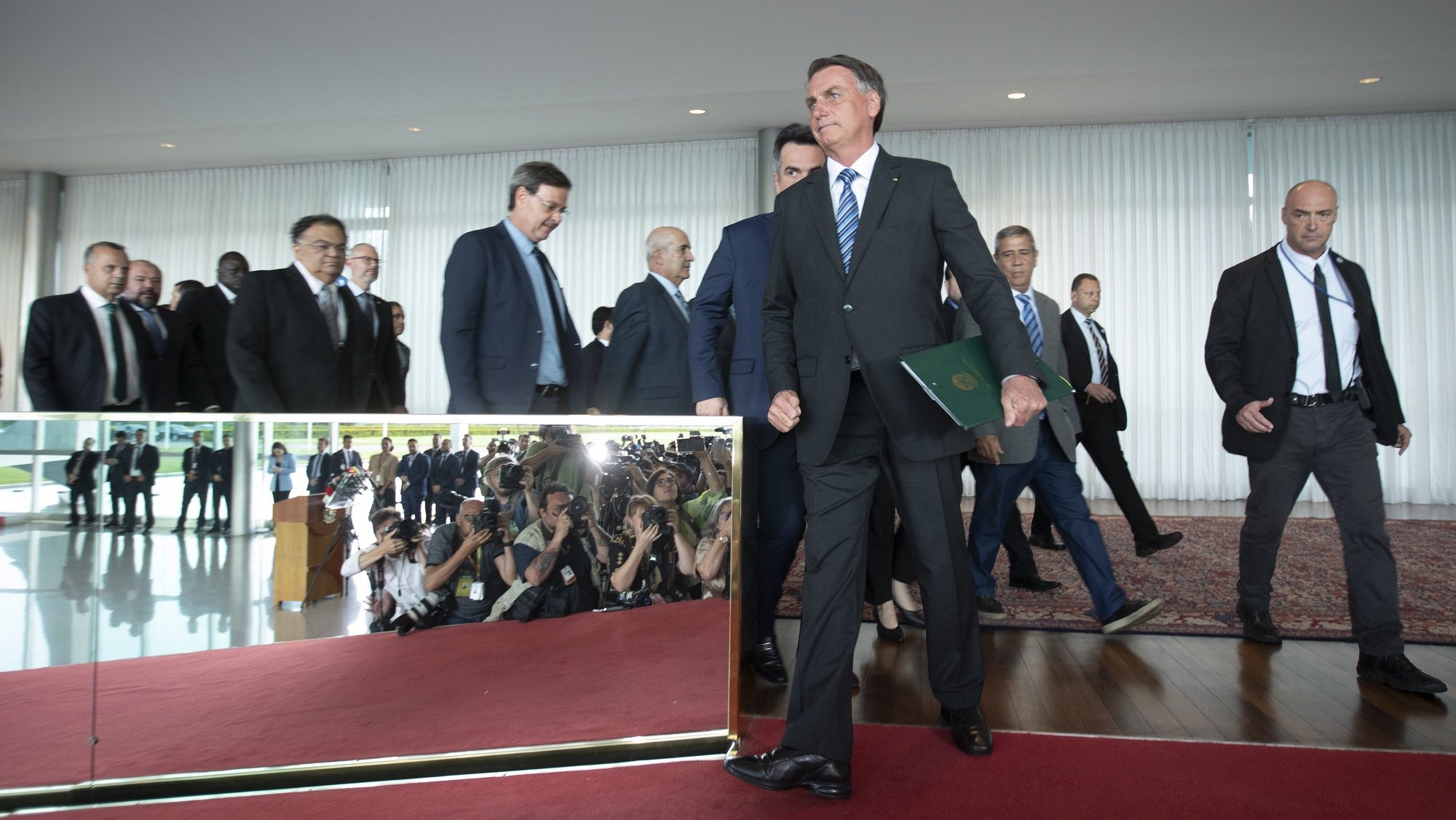 epaselect epa10279806 Out-going Brasilian president Jair Bolsonaro arrives to address the media about the results of the Presidential elections, Brasilia, Brazil, 01 November 2022. Bolsonaro, assured that he â€˜will continue to be faithful to the constitutionâ€™.  EPA/Joedson Alves