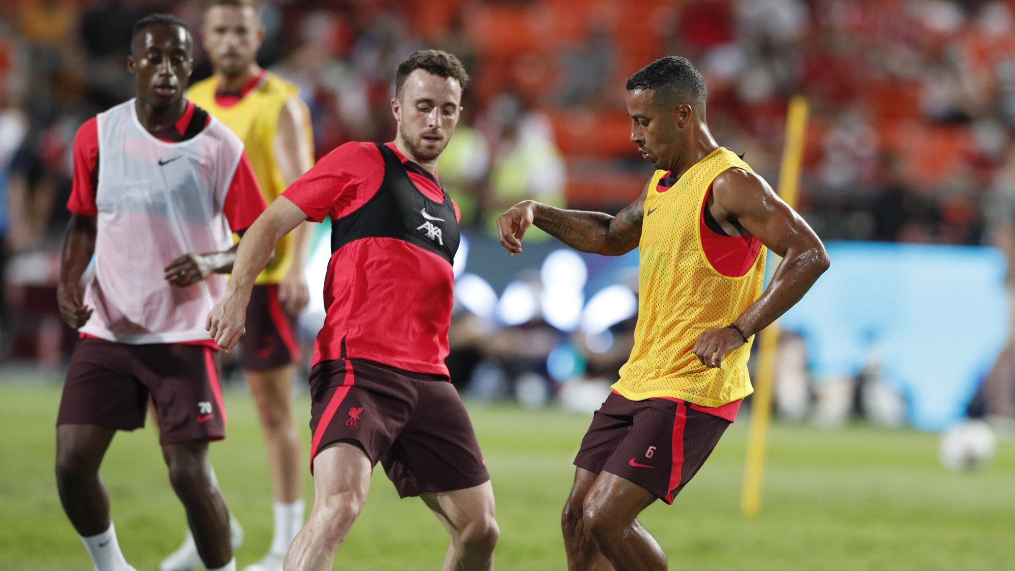 epa10065303 Liverpool players Diogo Jota (C) and Thiago Alcantara (R) perform during their team&#039;s training session for the pre-season tour soccer match between Liverpool FC and Manchester United at Rajamangala National Stadium in Bangkok, Thailand, 11 July 2022. Liverpool FC will face Manchester United in their Bangkok Century Cup pre-season tour soccer match on 12 July 2022 in Bangkok.  EPA/RUNGROJ YONGRIT