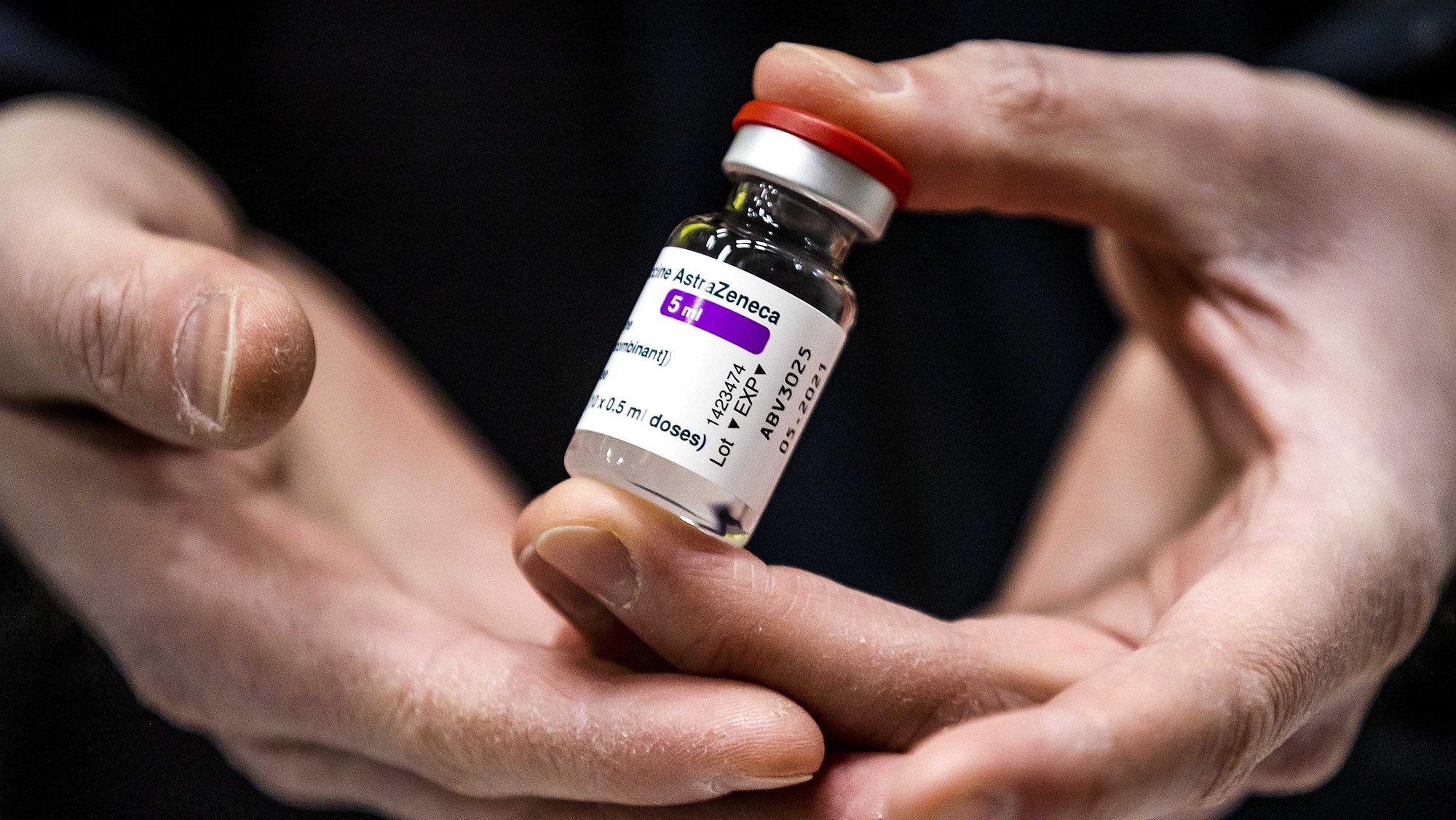 epa09074882 (FILE) - A vial of AstraZeneca&#039;s Covid-19 vaccine stored in Movianto in Oss, The Netherlands, 12 February 2021 (reissued 14 March 2021). The Dutch health ministry on 14 March 2021 said it was suspending the AstraZeneca vaccine rollout, just days after pressing ahead with its use.  EPA/Sem van der Wal