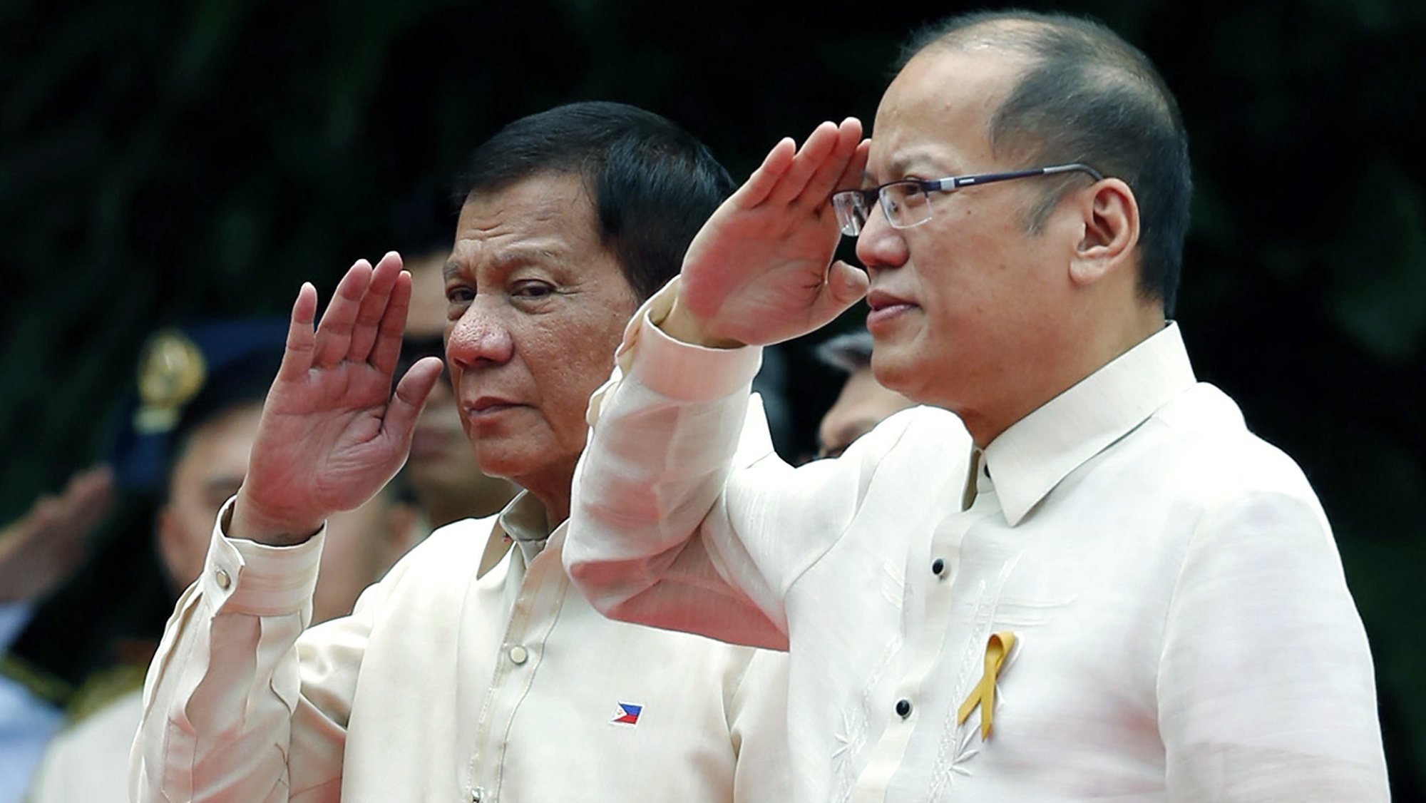 epa09297799 (FILE) - Incoming Filipino President Rodrigo Duterte (L) and outgoing President Benigno Aquino III (R) salute during Duterte&#039;s inauguration ceremony at the Malacanang presidential palace grounds in Manila, Philippines, 30 July 2016 (reissued 24 June 2021). Former president of the Philippines Benigno Aquino III died at the age of 61 on 24 June 2021.  EPA/FRANCIS R. MALASIG