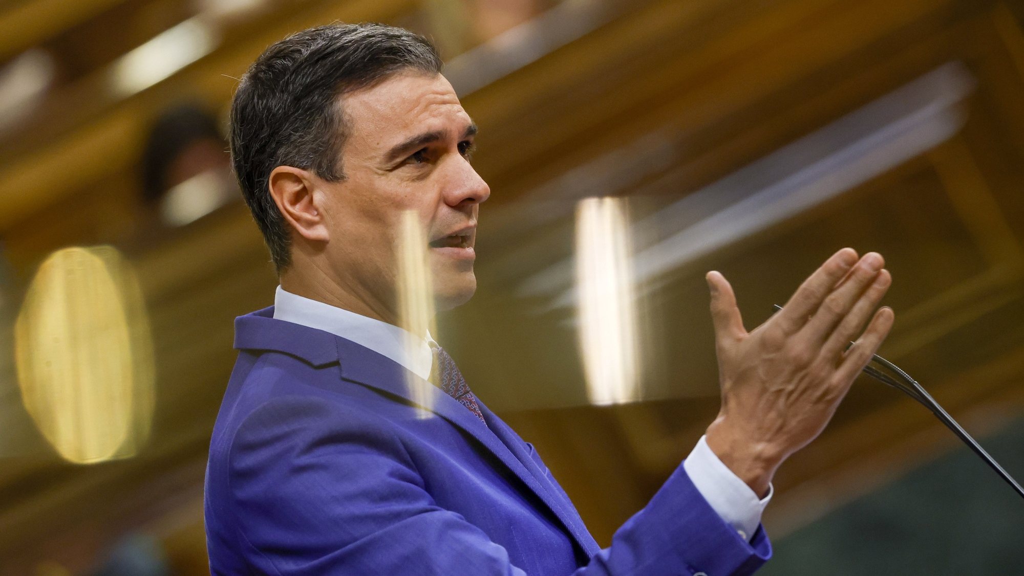 epa10534730 Spanish Prime Minister Pedro Sanchez speaks during a session at the Lower Chamber of Spanish Parliament in Madrid, Spain, 21 March 2023. Ramon Tamames, a former communist representing the far right party Vox, will lead a vote of no confidence against Sanchez.  EPA/J.J. GUILLEN