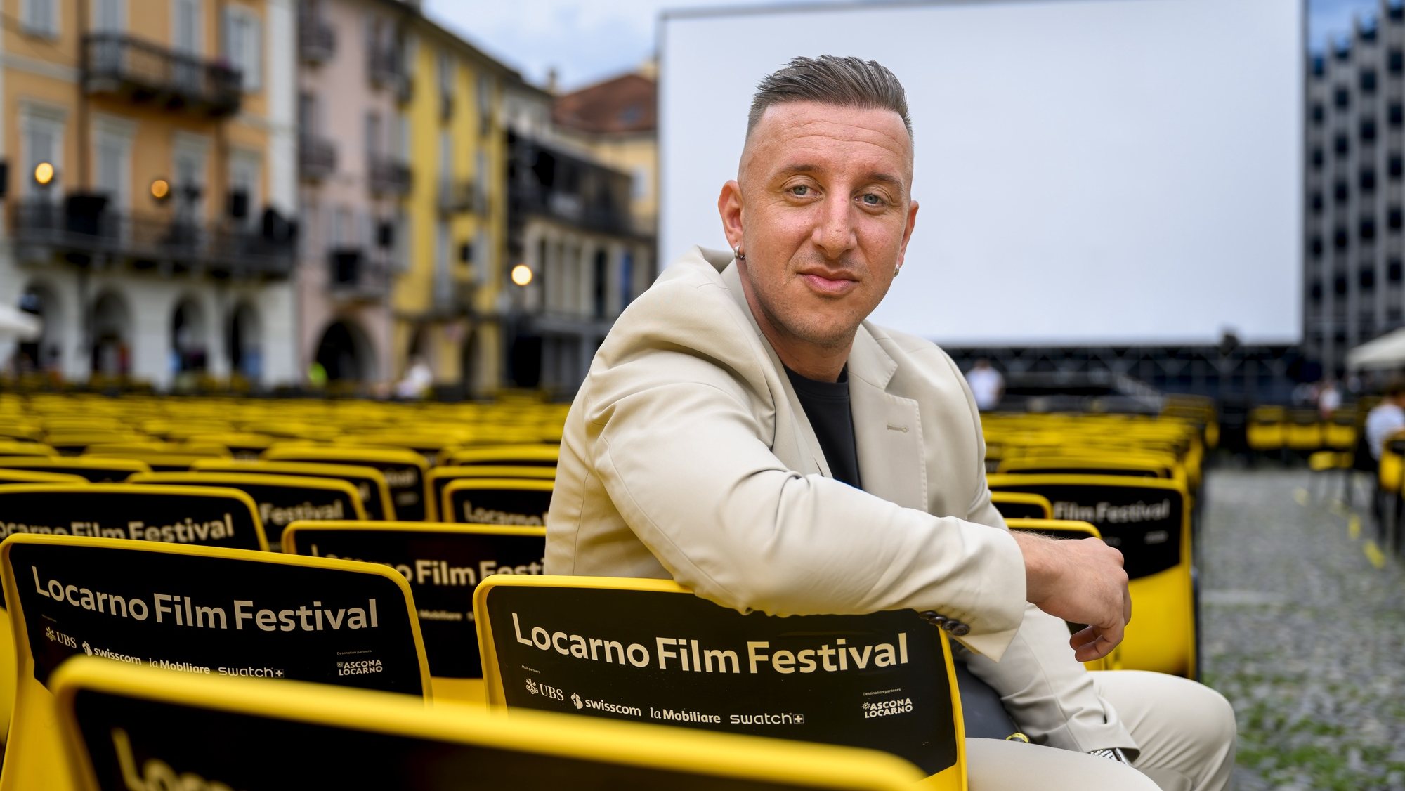 epa10784573 Swiss film director Basil Da Cunha poses on the Piazza Grande square for his movie &#039;Manga D&#039;Terra&#039; during the 76th Locarno International Film Festival in Locarno, Switzerland, 04 August 2023. The 76th Locarno Film Festival takes place from 02 to 12 August 2023.  EPA/JEAN-CHRISTOPHE BOTT