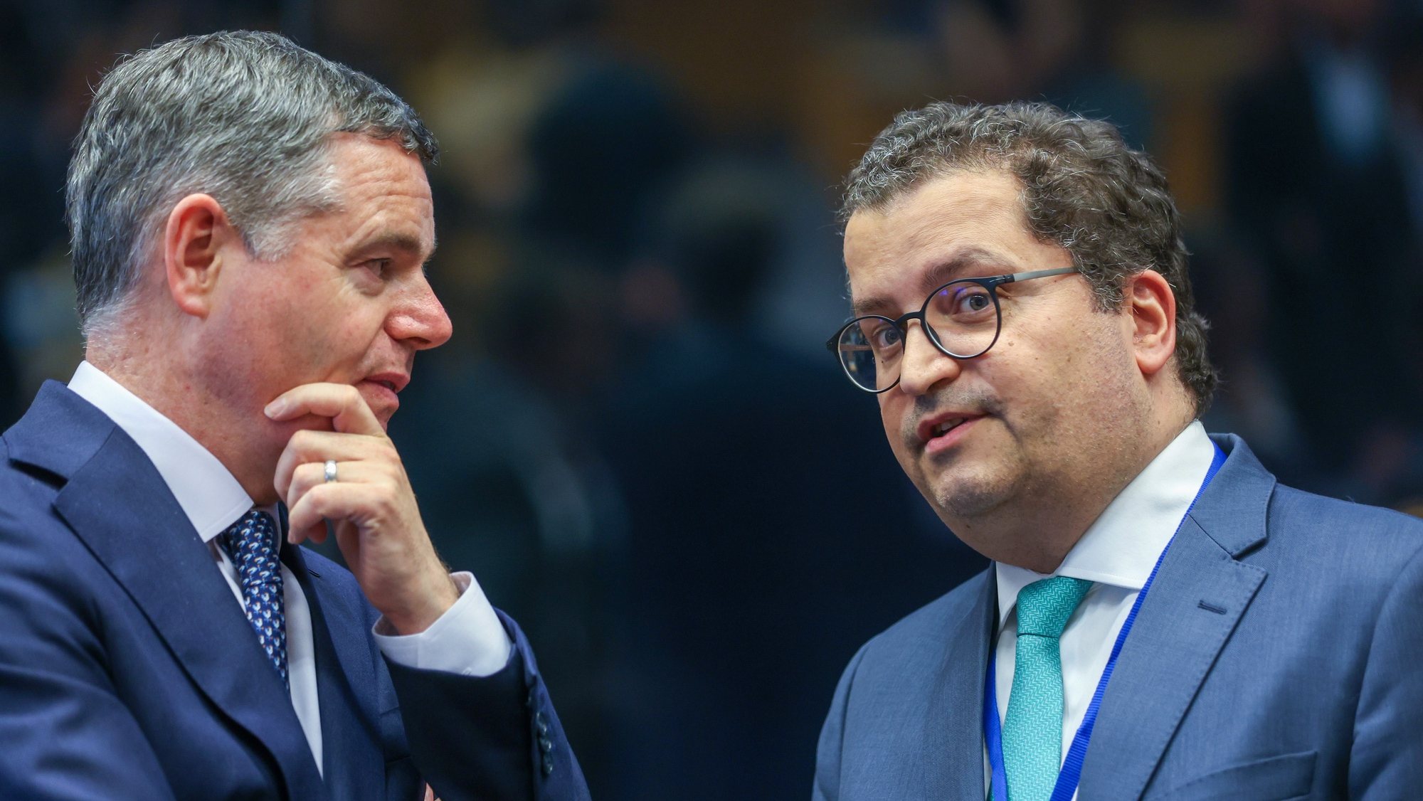 epa11425527 President of the Eurogroup Paschal Donohoe (L) and Portuguese Finance Minister Joaquim Miranda Sarmento (R) at the start of a Eurogroup finance ministers meeting in Luxembourg City, Luxembourg, 20 June 2024.  EPA/OLIVIER HOSLET