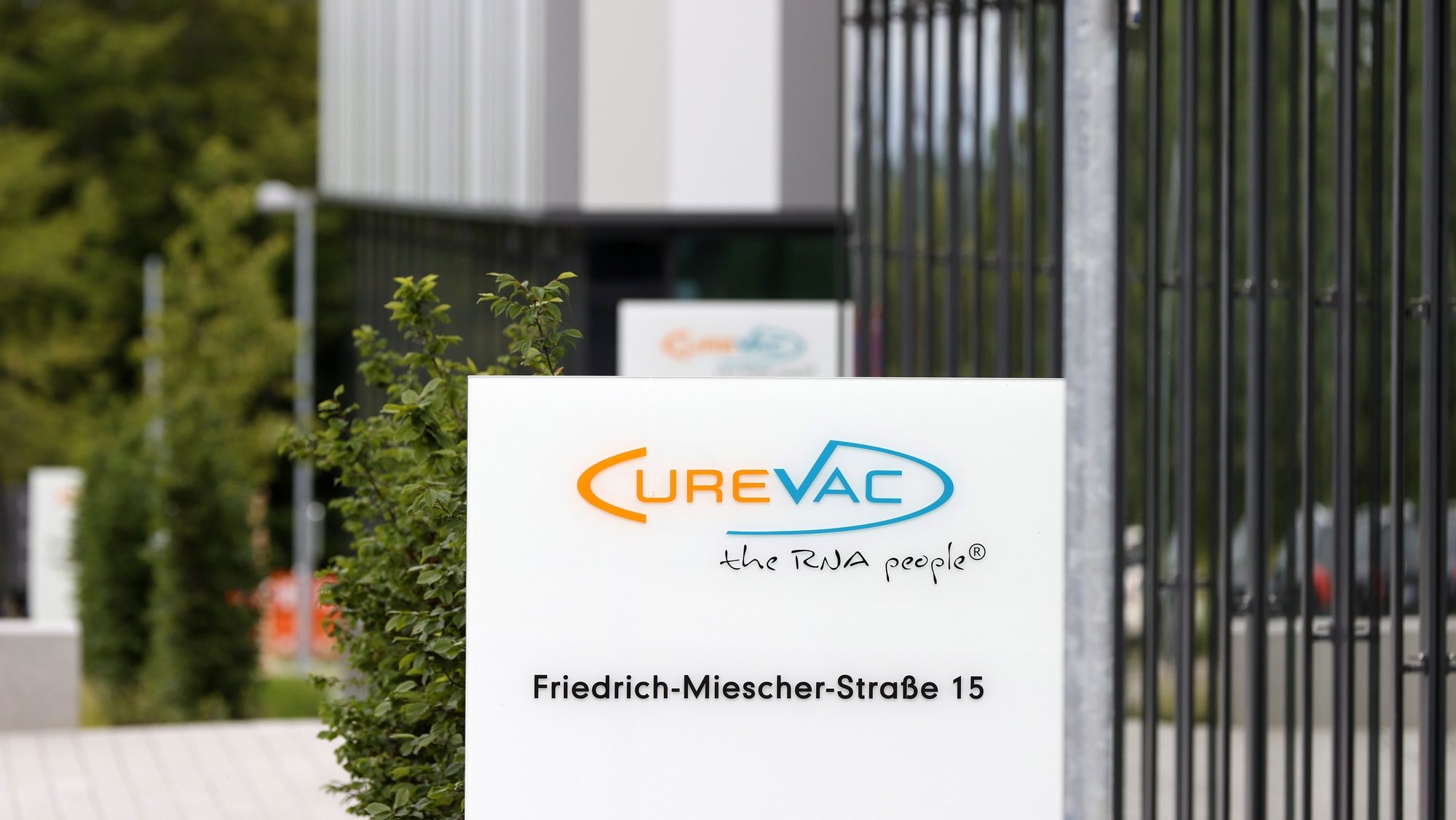 epa08495576 A view of a logo of biopharmaceutical company CureVac at the main building in Tuebingen, Germany, 19 June 2020. According to media reports, German biotech firm CureVac will launch clinical trials of a coronavirus vaccine that is approved by the Paul Ehrlich Institute.  EPA/RONALD WITTEK