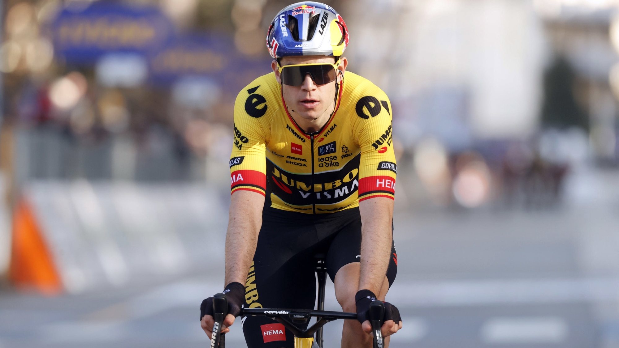 epa10507715 Wout Van Aert of the team Jumbo - Visma crosses the finish line after the second stage of the 58th Tirreno Adriatico cycling race, from Camaiore to Follonica, in Follonica, Italy, 07 March 2023.  EPA/ROBERTO BETTINI
