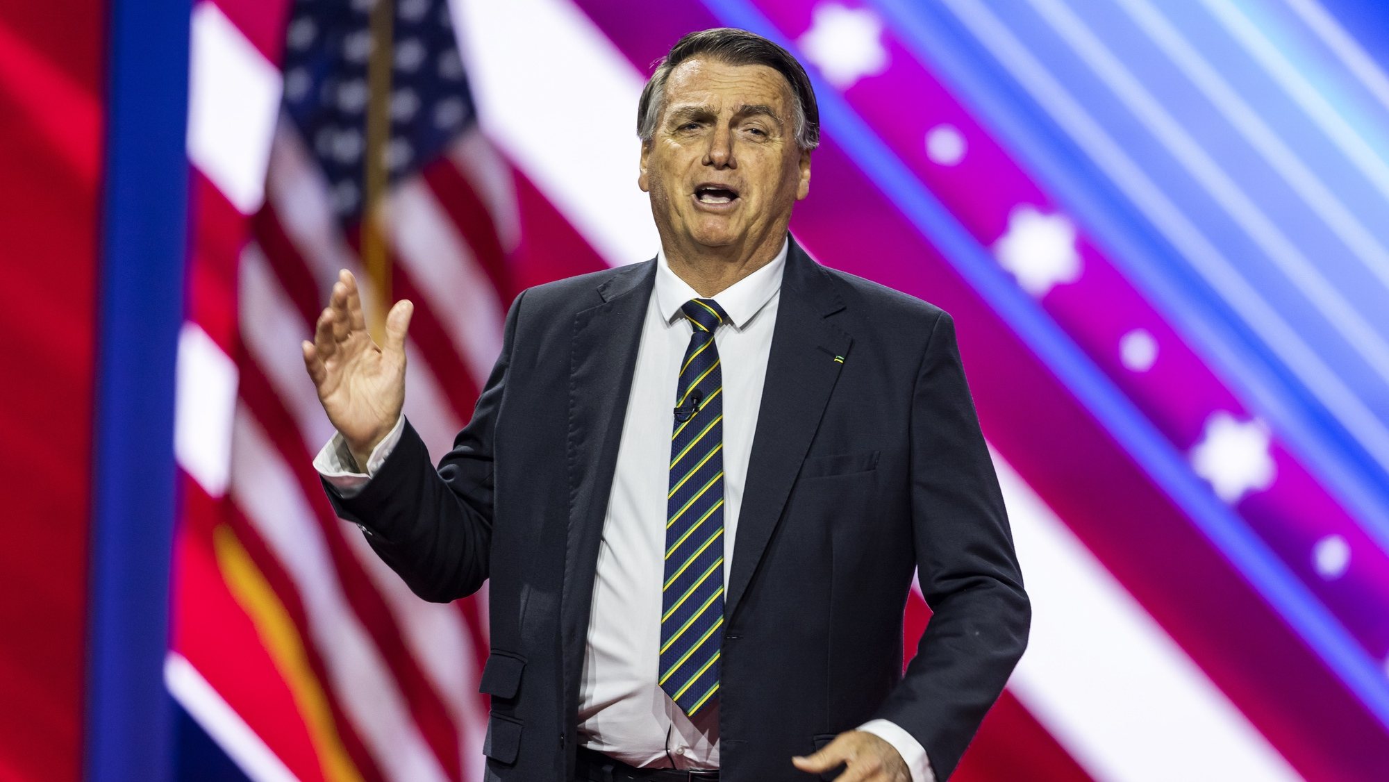 epa10503481 Former President of Brazil Jair Bolsonaro speaks at the Conservative Political Action Conference (CPAC), billed as the largest conservative gathering in the world, at the Gaylord National Resort &amp; Convention Center in National Harbor, Maryland, USA, 04 March 2023. Though this year’s speakers include former US President Donald Trump and former Brazilian President Jair Bolsonaro, many other conservatives are skipping the conference after a male campaign aid accused CPAC Chair Matt Schlapp of sexual assault.  EPA/JIM LO SCALZO