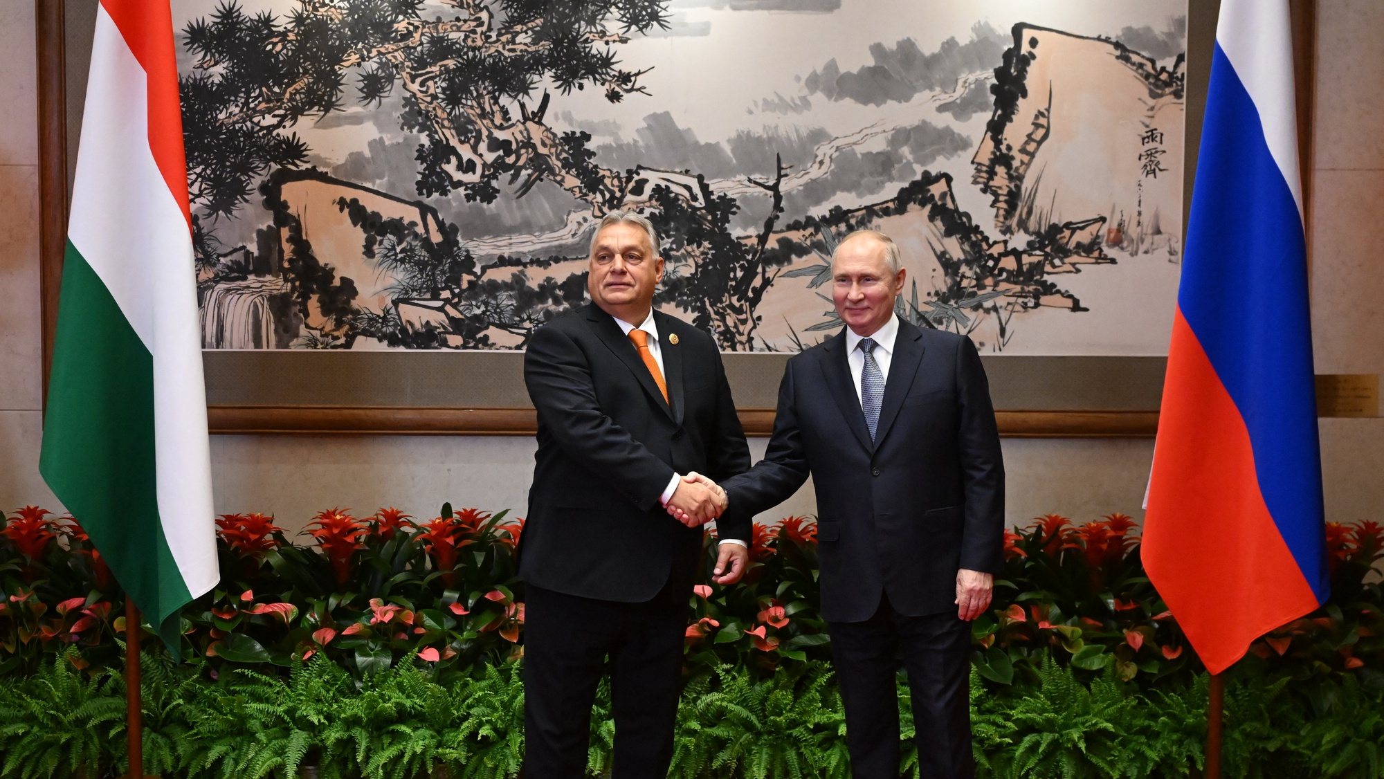 epa10923353 Hungarian Prime Minister Viktor Orban (L) and Russian President Vladimir Putin shake hands before their meeting as part of the 3rd Belt and Road Forum at the Diaoyutai State Guest House in Beijing, China, 17 October 2023. Russian President Vladimir Putin attends the &#039;One Belt, One Roadâ€™ forum in Beijing on October 17-18. As part of this trip, he plans to hold talks with Chinese President Xi Jinping.  EPA/GRIGORY SYSOEV /SPUTNIK / KREMLIN POOL MANDATORY CREDIT