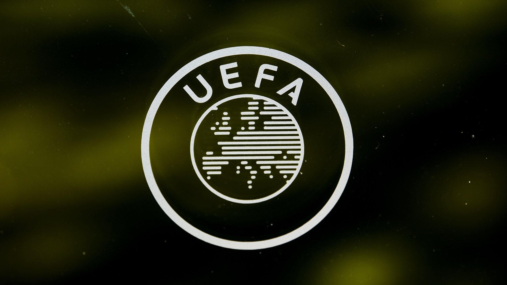 epa09792223 (FILE) - A UEFA logo is pictured through a window prior to the UEFA Europa League 2019/20 Round of 16 draw, at the UEFA Headquarters in Nyon, Switzerland, 28 February 2020 (re-issued on 28 February 2022). The world&#039;s football governing body FIFA together with the governing body of European football UEFA announced on 28 February 2022 to have decided together &#039;that all Russian teams, whether national representative teams or club teams, shall be suspended from participation in both FIFA and UEFA competitions until further notice&#039;.  EPA/JEAN-CHRISTOPHE BOTT *** Local Caption *** 55912791