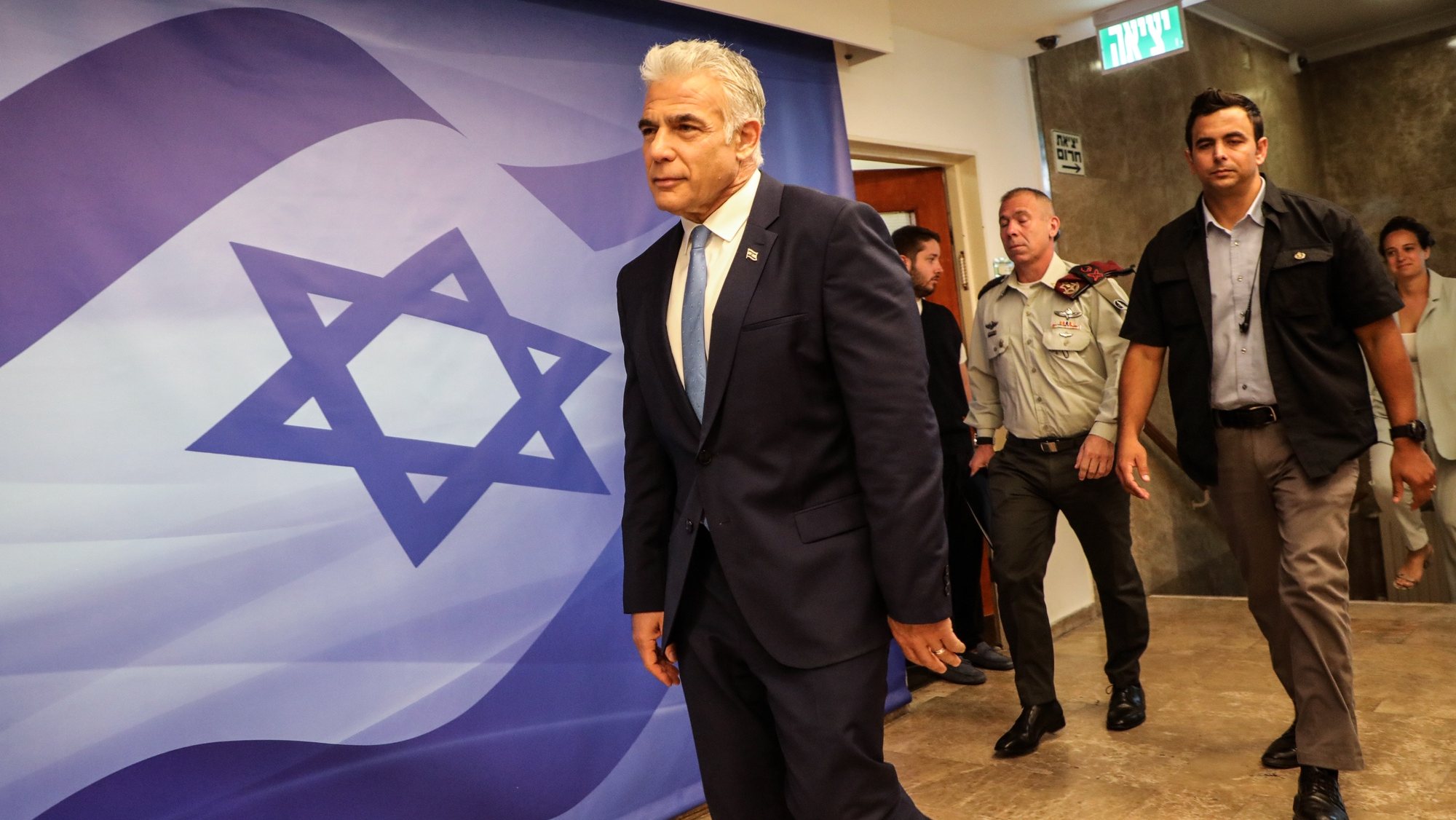 epa10099629 Israel&#039;s caretaker Prime Minister Yair Lapid arrives to attend the weekly cabinet meeting in Jerusalem, on July 31, 2022.  EPA/GIL COHEN-MAGEN / POOL