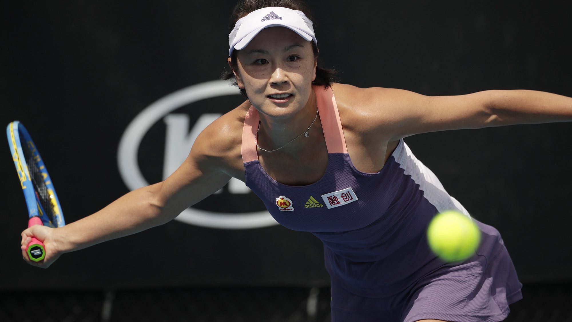 epa08145746 Peng Shuai of China in action during her women&#039;s singles first round match against Nao Hibino of Japan at the Australian Open Grand Slam tennis tournament in Melbourne, Australia, 21 January 2020. EPA/FRANCIS MALASIG