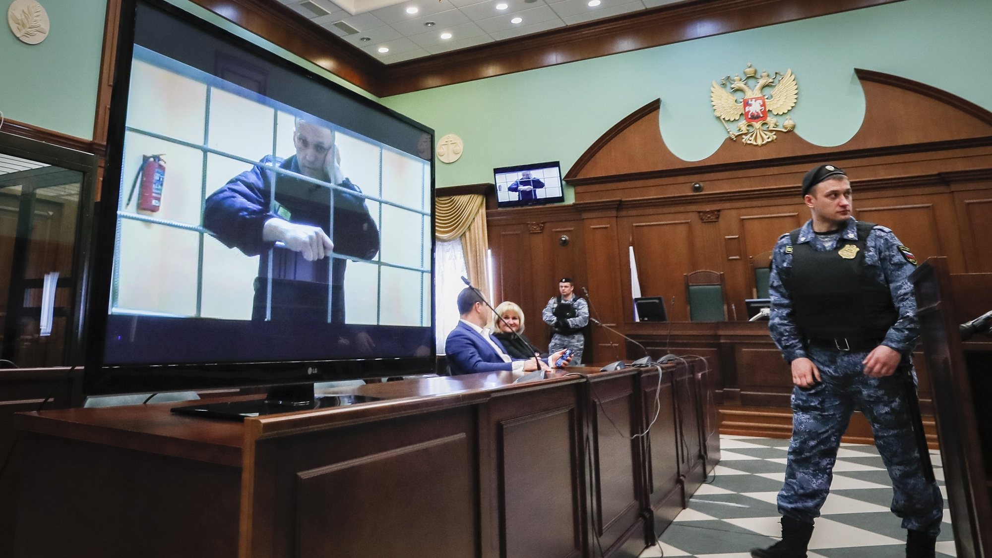 epa10481401 (FILE) - Russian opposition leader Alexei Navalny is shown on a monitor screen via video link from the penal colony No. 2 (IK-2) in Pokrov in Vladimir region, during a hearing of an appeal against Lefortovsky court sentence at the Moscow city court in Moscow, Russia, 24 May 2022 (reissued 21 February 2023). Russian troops on 24 February 2022, entered Ukrainian territory, starting a conflict that has provoked destruction and a humanitarian crisis. One year on, fighting continues in many parts of the country.  EPA/YURI KOCHETKOV  ATTENTION: This Image is part of a PHOTO SET