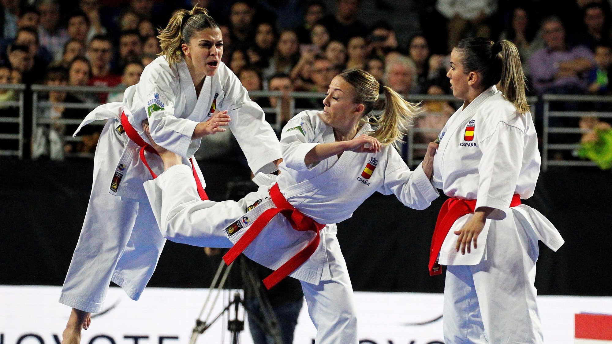epa07158448 Members of team Spain perform during the women&#039;s Team Kata final against Japan at the 24th Karate World Championships in Madrid, Spain, 11 November 2018. Team Japan won the gold medal.  EPA/VICTOR LERENA
