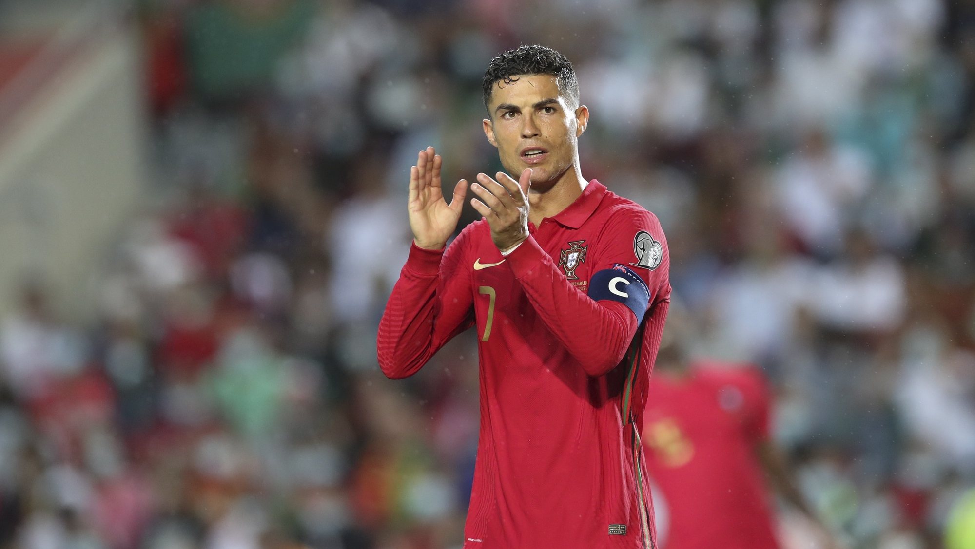 epa09520962 Cristiano Ronaldo of Portugal reacts during the FIFA World Cup 2022 qualifying group A soccer match at Algarve Stadium in Loule, Portugal, 12 October 2021.  EPA/ANTONIO COTRIM