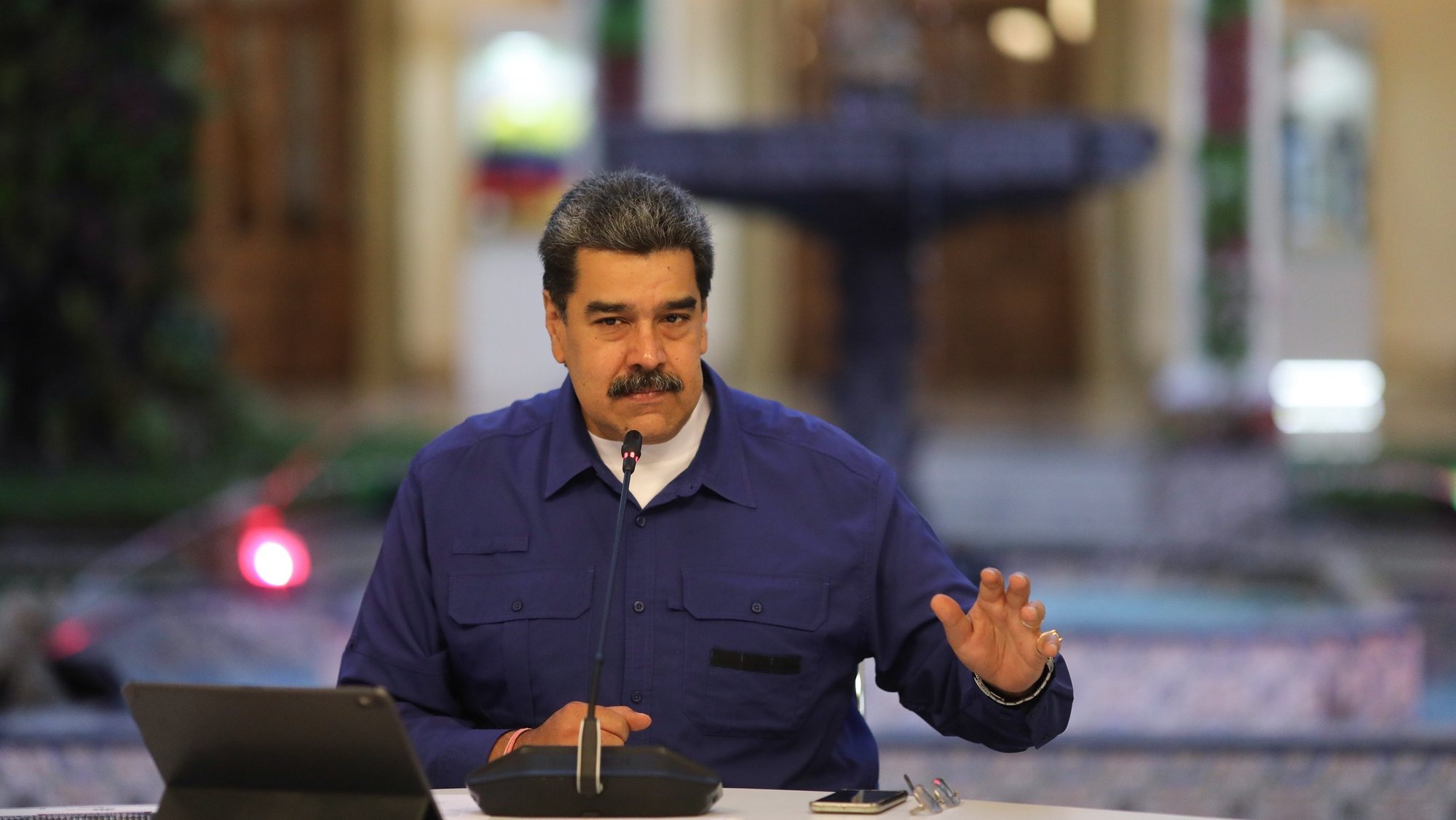 epa09941386 A handout photo made available by the press office of the Miraflores Palace shows the President of Venezuela Nicolas Maduro during statements at the Miraflores Palace, in Caracas, Venezuela, 11 May 2022. Maduro urged all the productive sectors to expand their production, and as a specific goal, to &#039;build an export route that occupies at least 20 percent of the production&#039;, in addition to the participation in the national market.  EPA/press office of the Miraflores P HANDOUT EDITORIAL USE ONLY/ONLY AVAILABLE TO ILLUSTRATE THE ACCOMPANYING NEWS (MANDATORY CREDIT) HANDOUT EDITORIAL USE ONLY/NO SALES