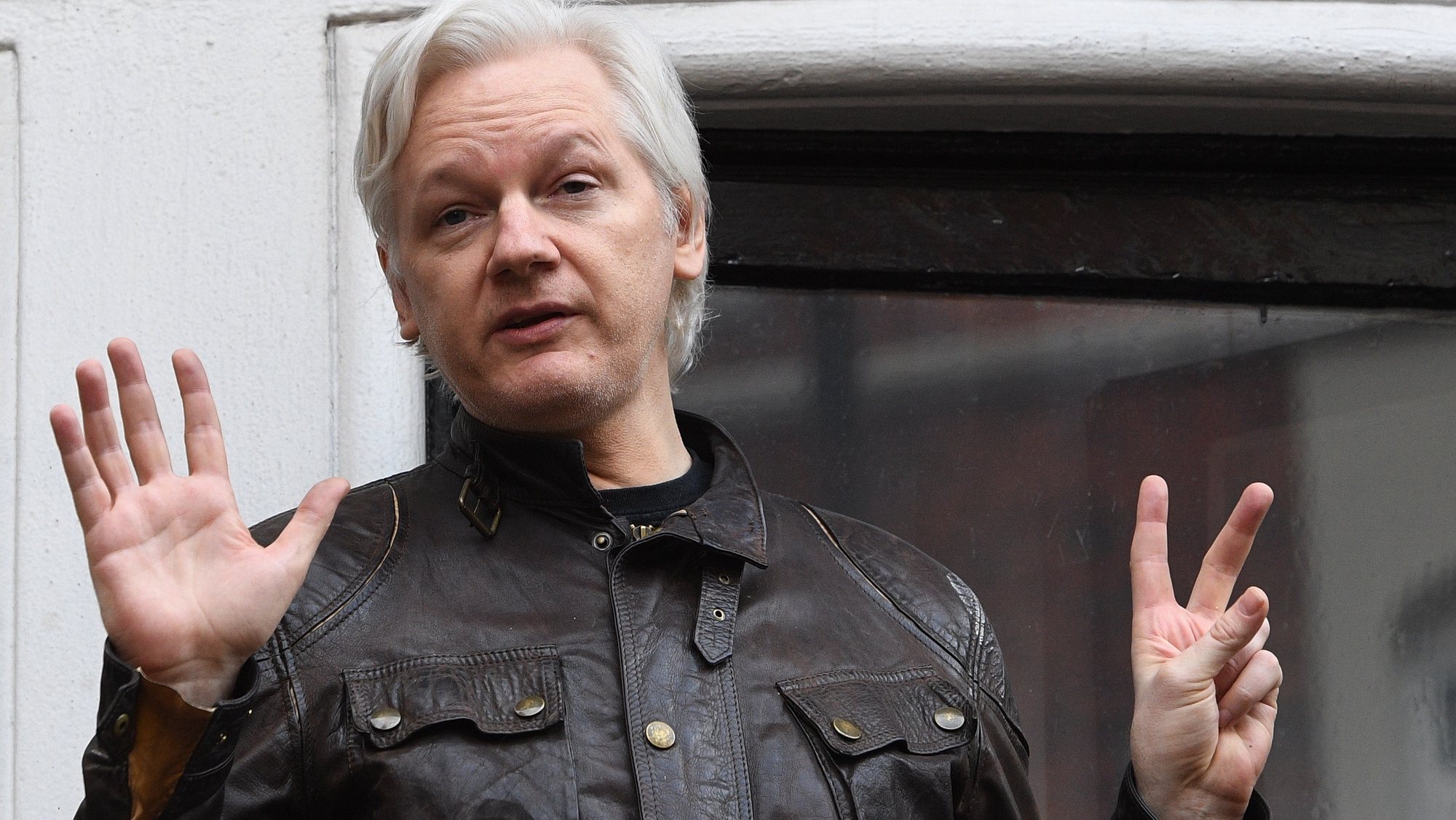 epa07539717 (FILE) - Wikileaks founder Julian Assange speaks to reporters on the balcony of the Ecuadorian Embassy in London, Britain, 19 May 2017 (reissued 01 May 2019). Reports on 01 May 2019 state Wikileaks founder Julian Assange has been sentenced by a court in London to 50 weeks in jail for breaching his bail in 2012. Assange breached his bail in 2012 by entering the Ecuadorean embassy in London in a bid to avoid being extradited to Sweden to face allegations of rape and sexual assault. Assange was arrested at Ecuadorean embassy in March 2019.  EPA/FACUNDO ARRIZABALAGA *** Local Caption *** 55004940