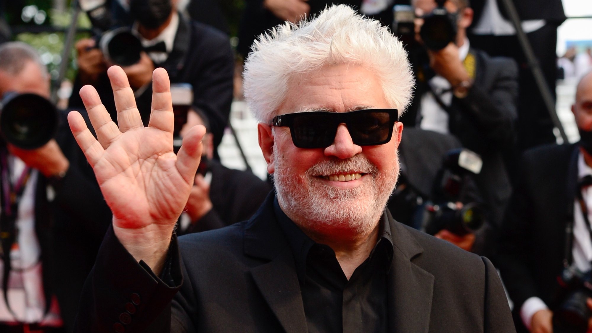 epa09326650 Pedro Almodovar arrives for the screening of &#039;Annette&#039; and the Opening Ceremony of the 74th annual Cannes Film Festival, in Cannes, France, 06 July 2021. Presented in competition, the movie opens the festival which runs from 06 to 17 July.  EPA/CAROLINE BLUMBERG