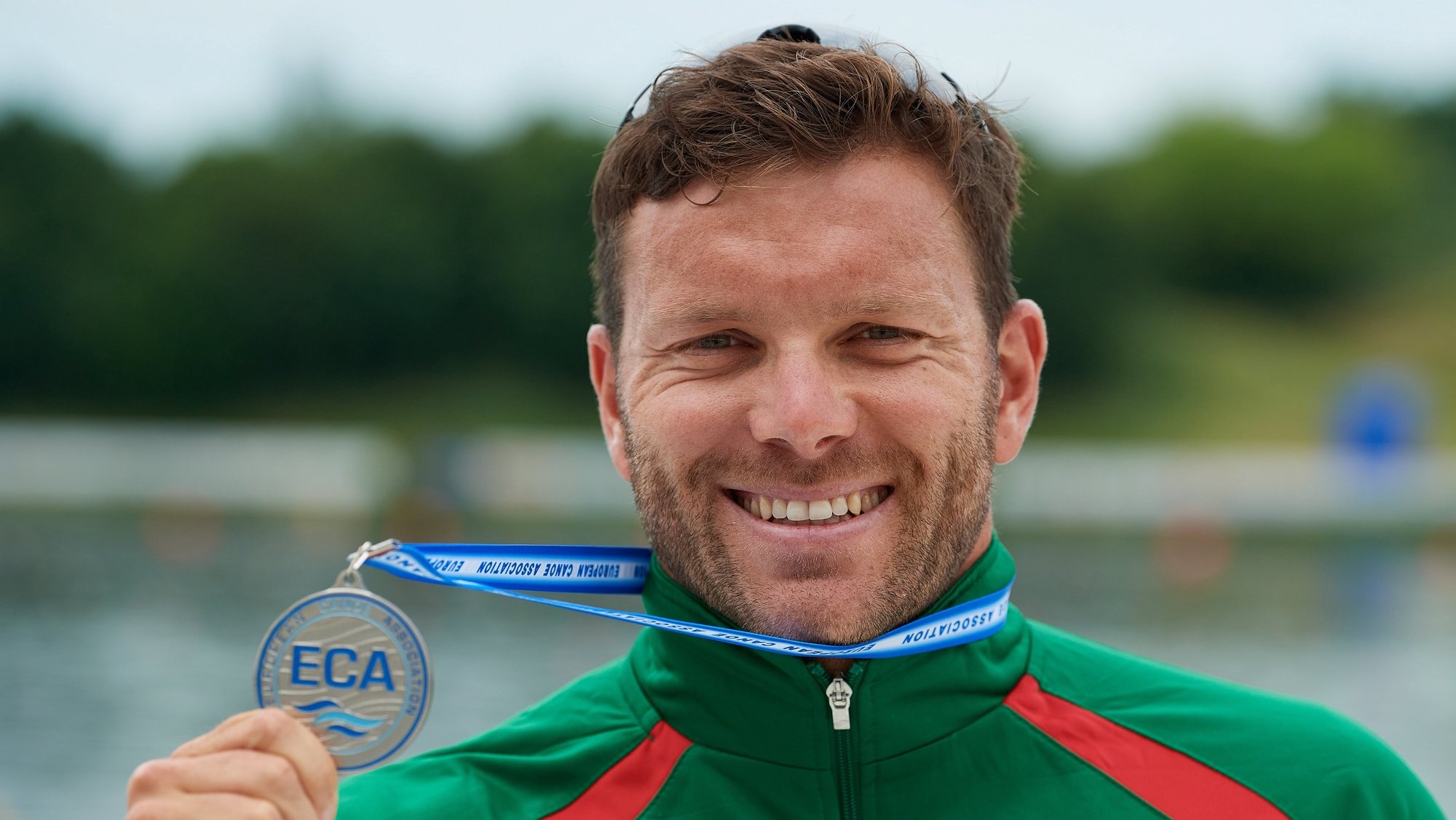 epa09248589 Joao Ribeiro of Portugal poses with his silver medal for the 500 m K1 men at the 2021 ECA Canoe Sprint and Paracanoe European Championships in Poznan, Poland, 04 June 2021.  EPA/Adam Warzawa POLAND OUT