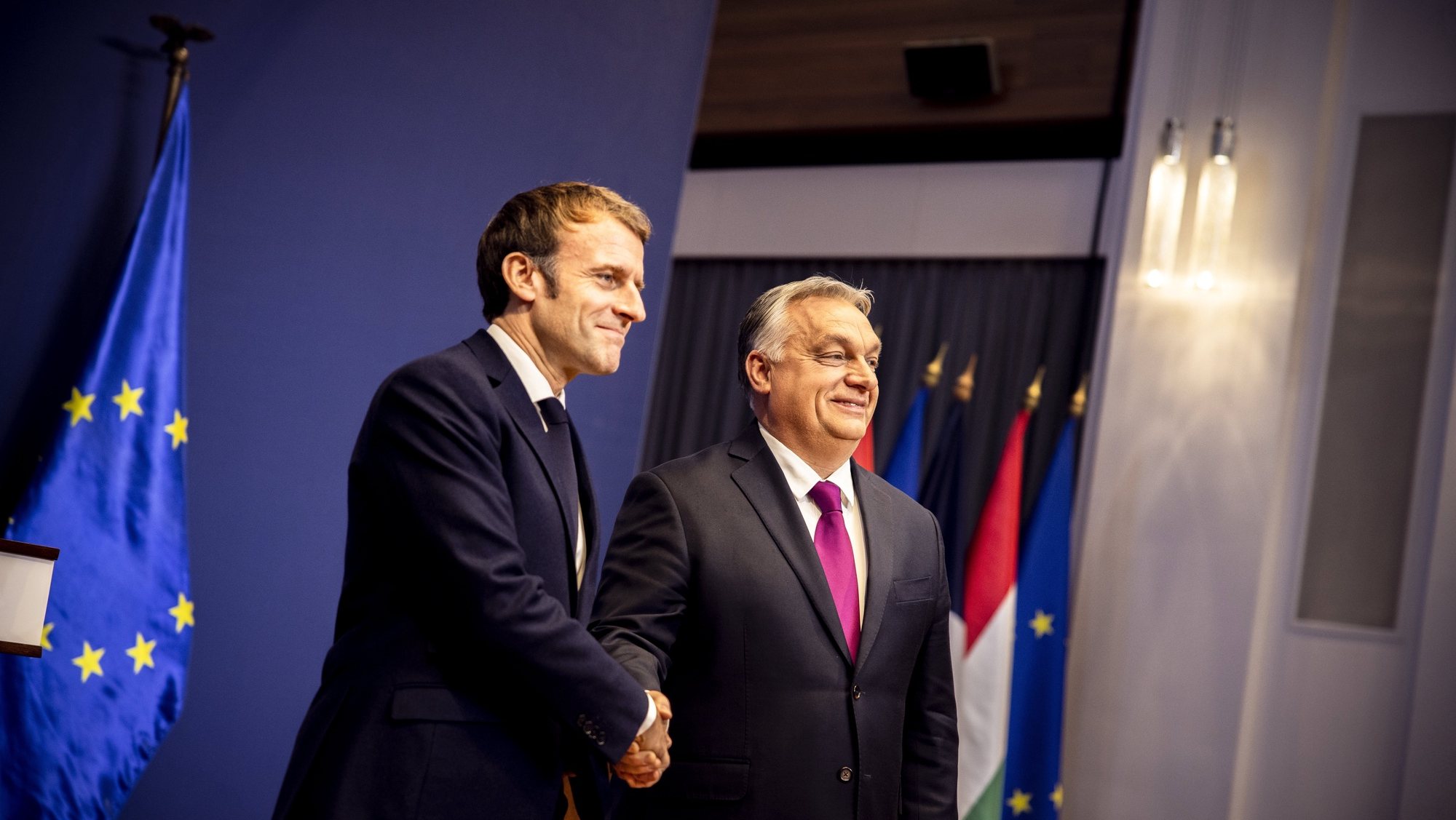 epa09640206 A handout photo made available by the Hungarian Prime Minister&#039;s Press Office shows Hungarian Prime Minister Viktor Orban (R) shaking hands with French President Emmanuel Macron (L) after their meeting at the Hungarian Prime Minister&#039;s Office in Budapest, Hungary, 13 December 2021.  EPA/Zoltan Fischer HANDOUT  HANDOUT EDITORIAL USE ONLY/NO SALES