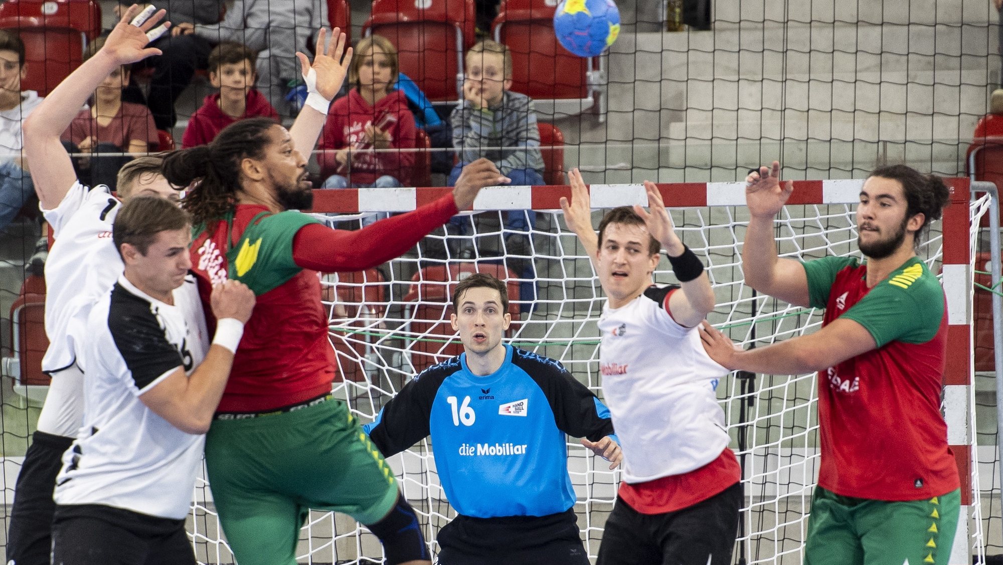 epa07264064 Switzerland&#039;s Nikola Portner (C) reacts during the Yellow Cup Handball game between Switzerland and Portugal in Switzerland, Winterthur, 05 January 2019.  EPA/ENNIO LEANZA