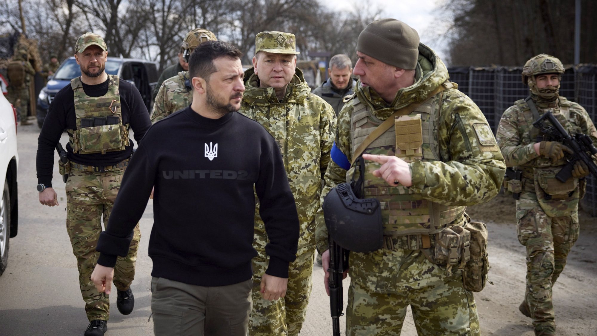 epa10547201 A handout photo made available by the Ukrainian Presidential Press Service shows Ukrainian President Volodymyr Zelensky (L) walking at an undisclosed position of Ukrainian frontier guards in the Sumy area, Ukraine, 28 March 2023. Zelensky inspected the units of the State Border Guard Service during his working visit to the border area with Russia. Russian troops on 24 February 2022, entered Ukrainian territory, starting a conflict that has provoked destruction and a humanitarian crisis.  EPA/PRESIDENTIAL PRESS SERVICE HANDOUT  HANDOUT EDITORIAL USE ONLY/NO SALES