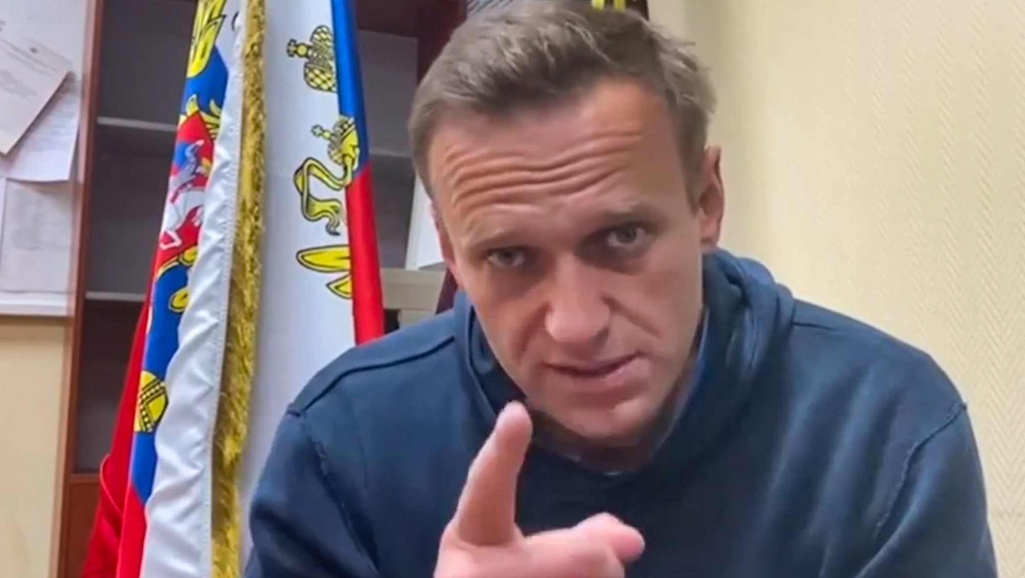 epa08946668 A handout still image taken from a handout video footage posted in the Instagram account of Alexei Navalny shows Russian opposition leader and anti-corruption activist Alexei Navalny after a court hearing at a police station in Khimki outside Moscow, Russia, 18 January 2021. A judge on 18 January ruled that Navalny remains in custody for 30 days after his airport arrest on 17 January 2020 following his arrival from Germany.  EPA/NAVALNY PRESS TEAM / HANDOUT  HANDOUT EDITORIAL USE ONLY/NO SALES