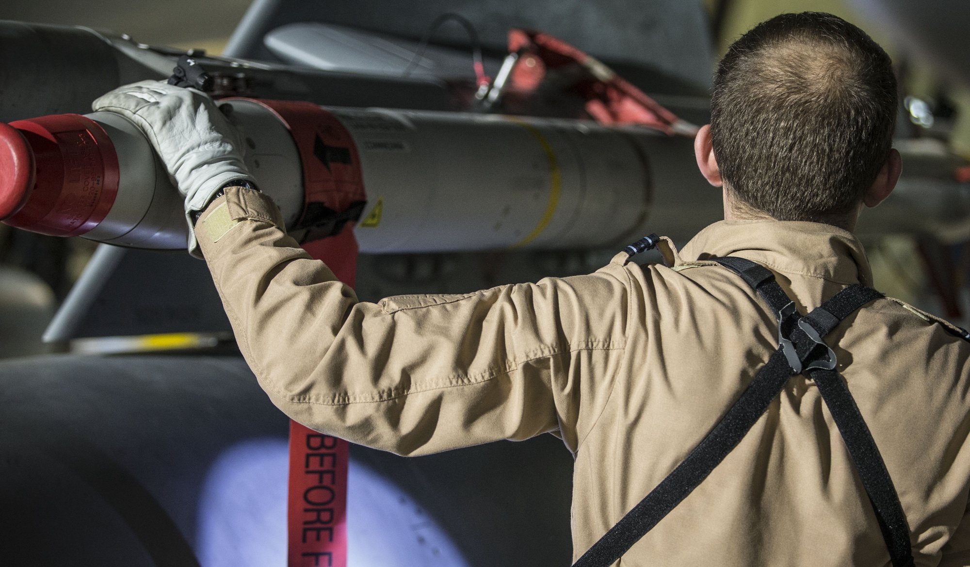 epa06667948 A handout photo made available by the British Ministry of Defence (MoD) showing a British Royal Air Force (RAF) Tornado pilot checking the weapons on his Tornado aircfraft at RAF Akrotiri, Cyprus, 14 April 2018.The MoD report that four RAF Tornado&#039;s took off on 14 April 2018 from RAF Akrotiri to conduct precision strikes on Syrian installations involved in the use of chemical weapons. The Tornados, flown by 31 Squadron the Goldstars, were supported by a Voyager aircraft. They launched Storm Shadow missiles at a military facility â€“ a former missile base â€“ some fifteen miles west of Homs, where the regime is assessed to keep chemical weapon precursors stockpiled in breach of Syriaâ€™s obligations under the Chemical Weapons Convention.  Very careful scientific analysis was applied to determine where best to target the Storm Shadows to maximise the destruction of the stockpiled chemicals and to minimise any risks of contamination to the surrounding area.  The facility which was struck is located some distance from any known concentrations of civilian habitation, reducing yet further any such risk.  EPA/Cpl L MATTHEWS / BRITISH MINISTRY OF DEFENCE / HANDOUT MANDATORY CREDIT MOD: CROWN COPYRIGHT HANDOUT EDITORIAL USE ONLY/NO SALES